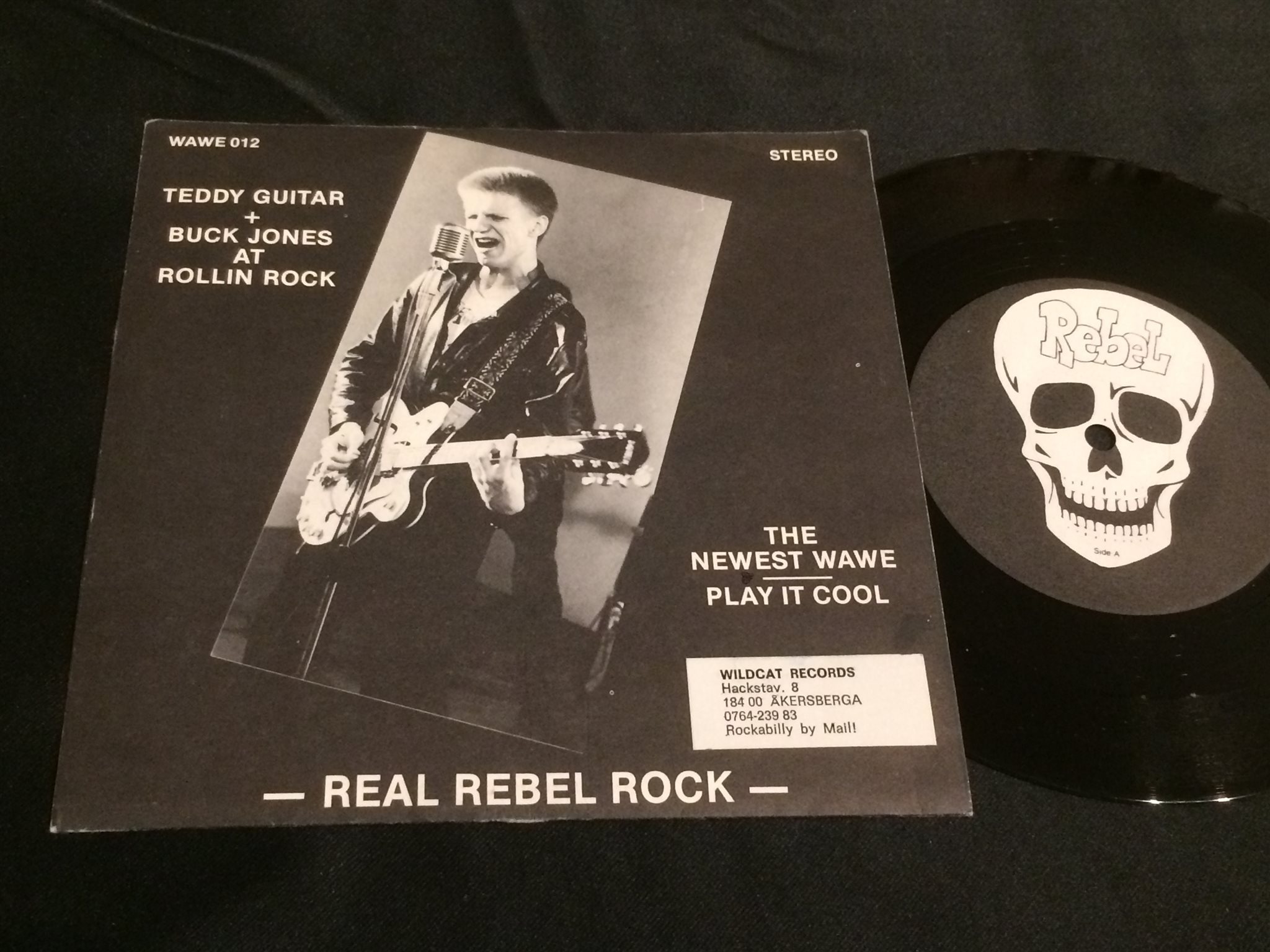 Omslagsbild för skivan BUCK JONES & TEDDY GUITAR the newest wave 45 -81 Finland REBEL WAVE 012 rare