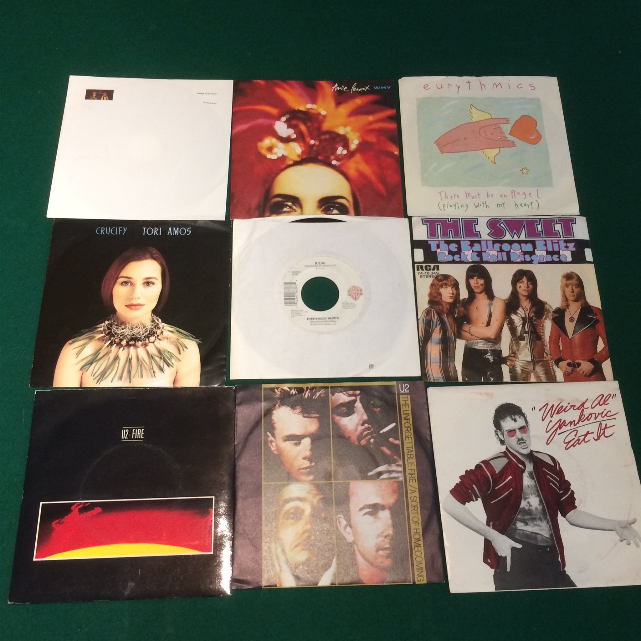 Omslagsbild för skivan 49 singlar PUNK rock POP  t.ex Clash, Cure, R.E.M.