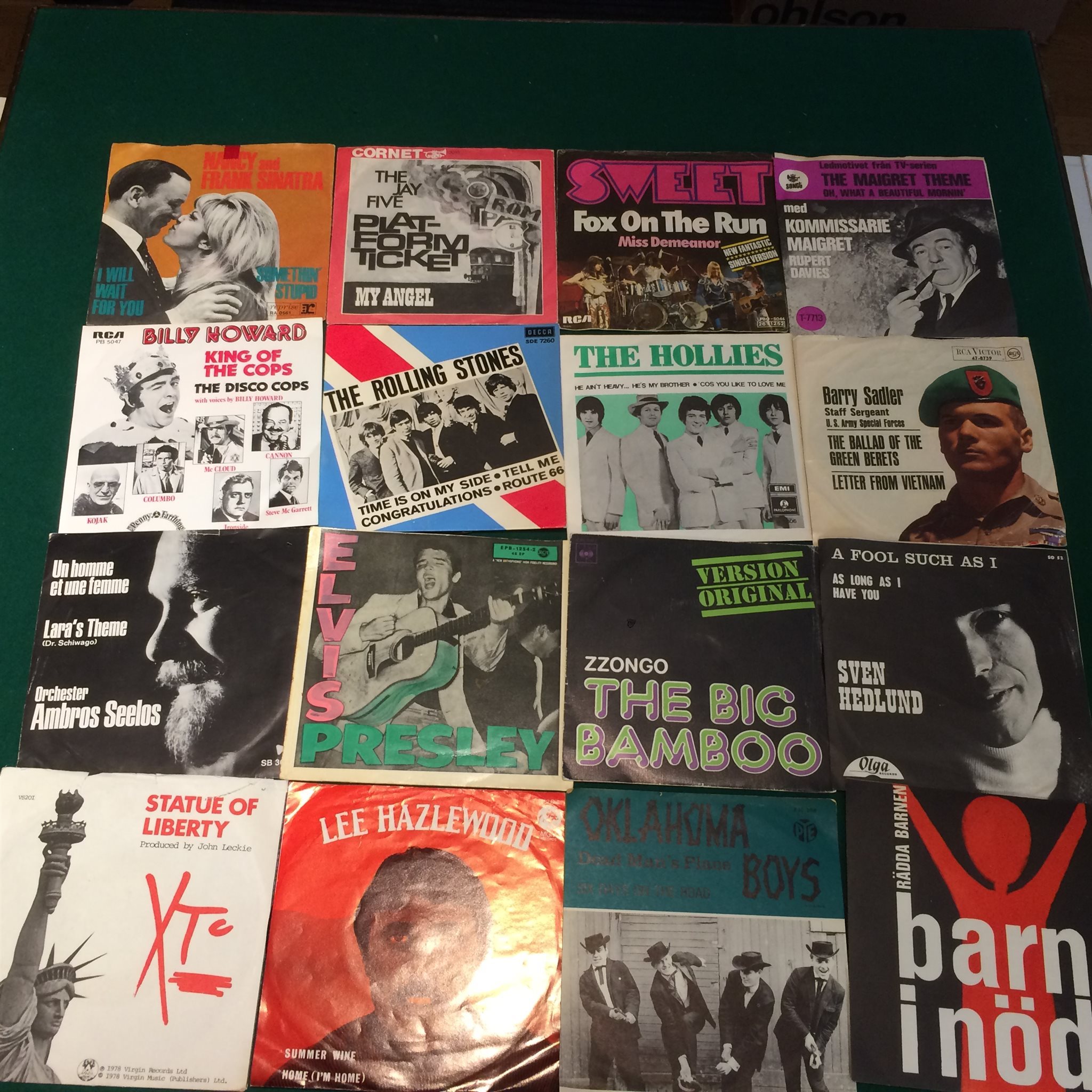 Omslagsbild för skivan 48 singlar Elvis ROLLING STONES Bob Dylan osv.