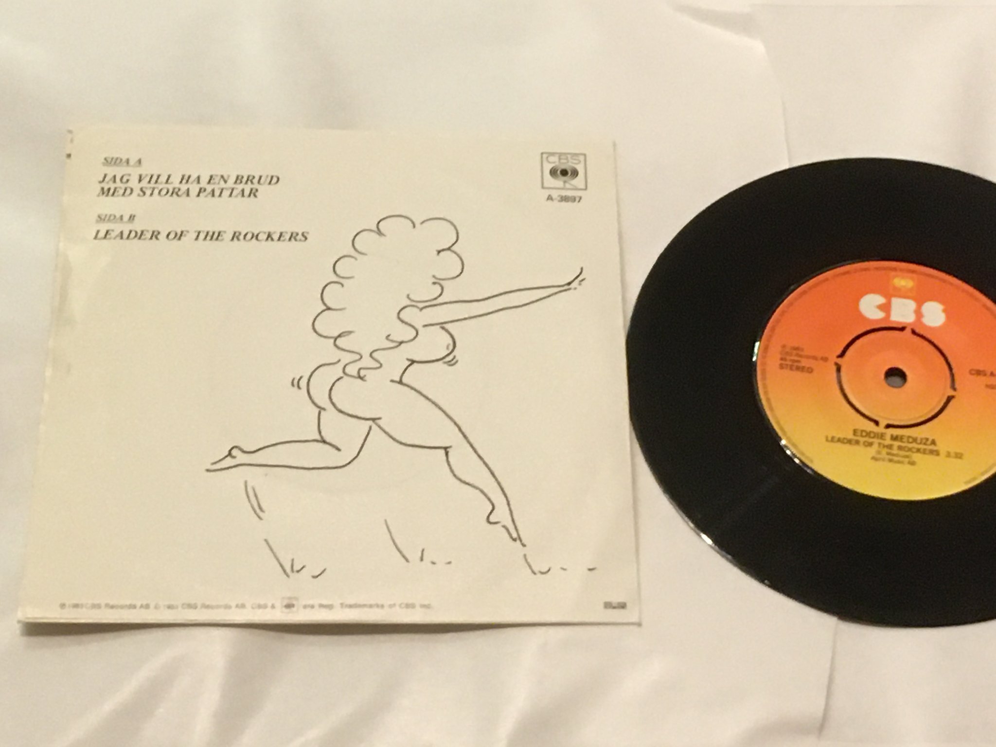 Omslagsbild för skivan EDDIE MEDUZA jag vill ha en brud med stora pattar 7”single -83 Swe CBS A-3897