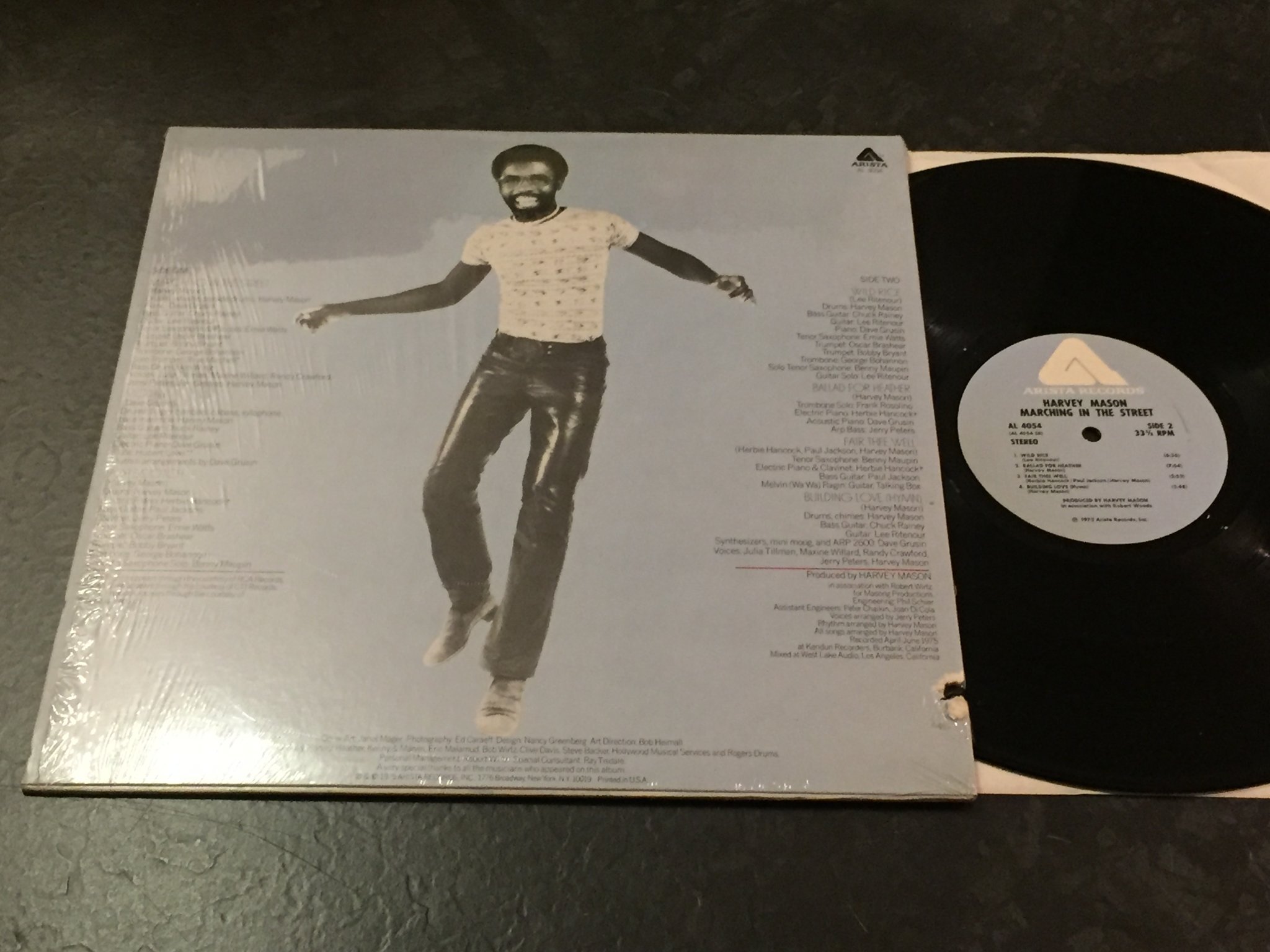 Omslagsbild för skivan HARVEY MASON marching in the street LP -75 US ARISTA AL 4054