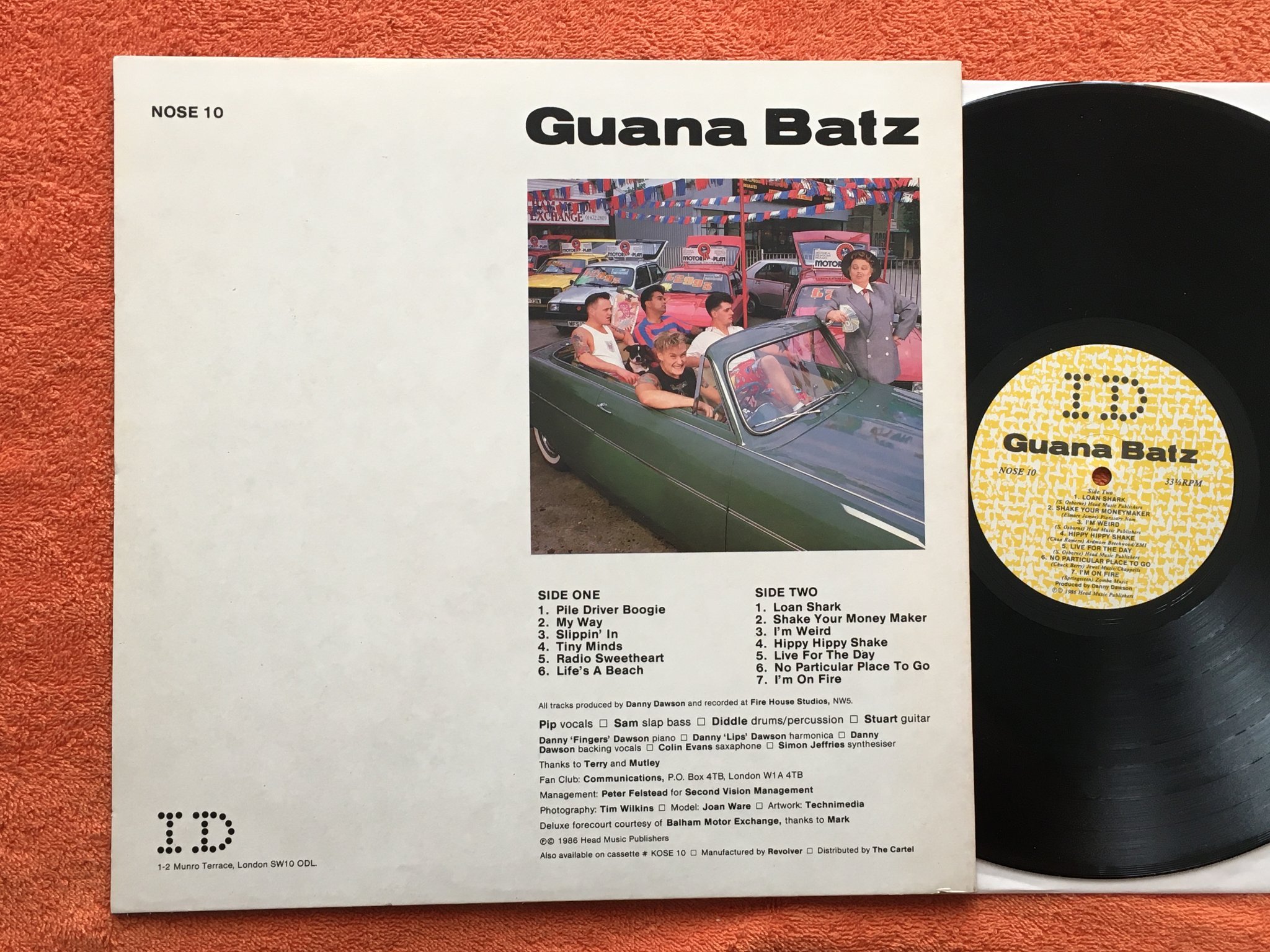 Omslagsbild för skivan GUANA BATZ loan sharks LP -86 HEAD MUSIC NOSE 10