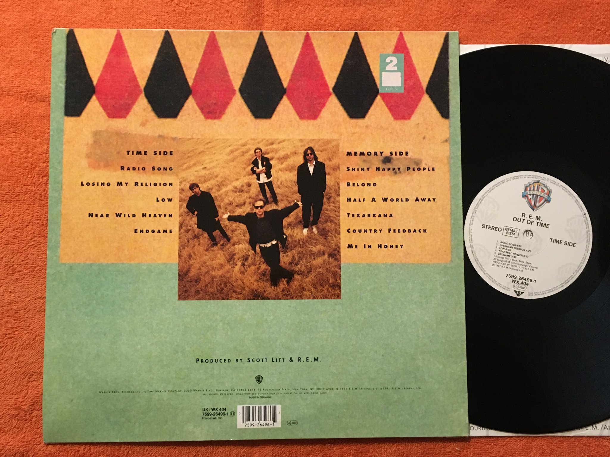 Omslagsbild för skivan R.E.M. out of time LP -91 WARNER BROS 7599-26496-1