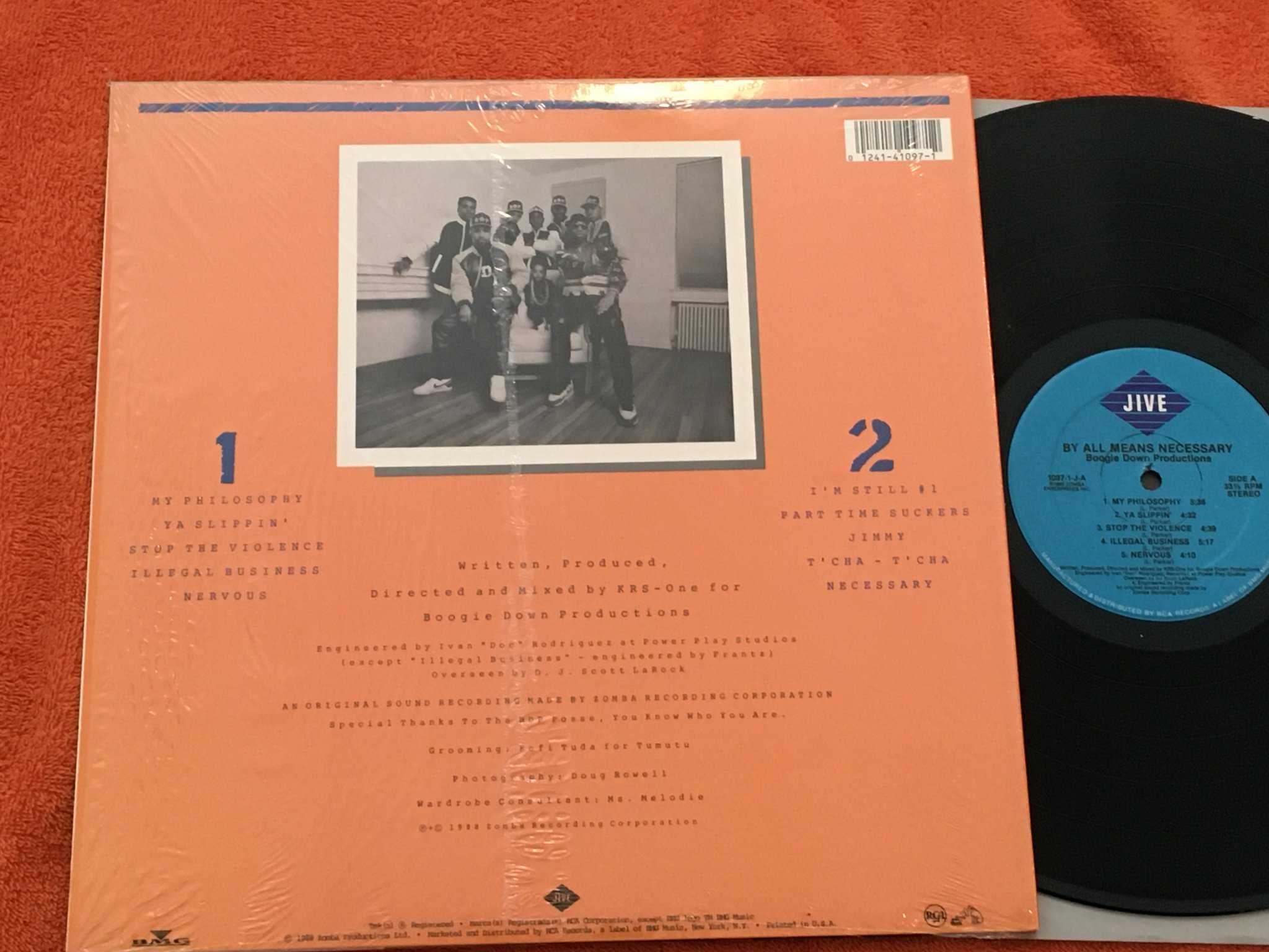 Omslagsbild för skivan BOOGIE DOWN PRODUCTION by all means necessary LP -88 US JIVE 1097-1-J 