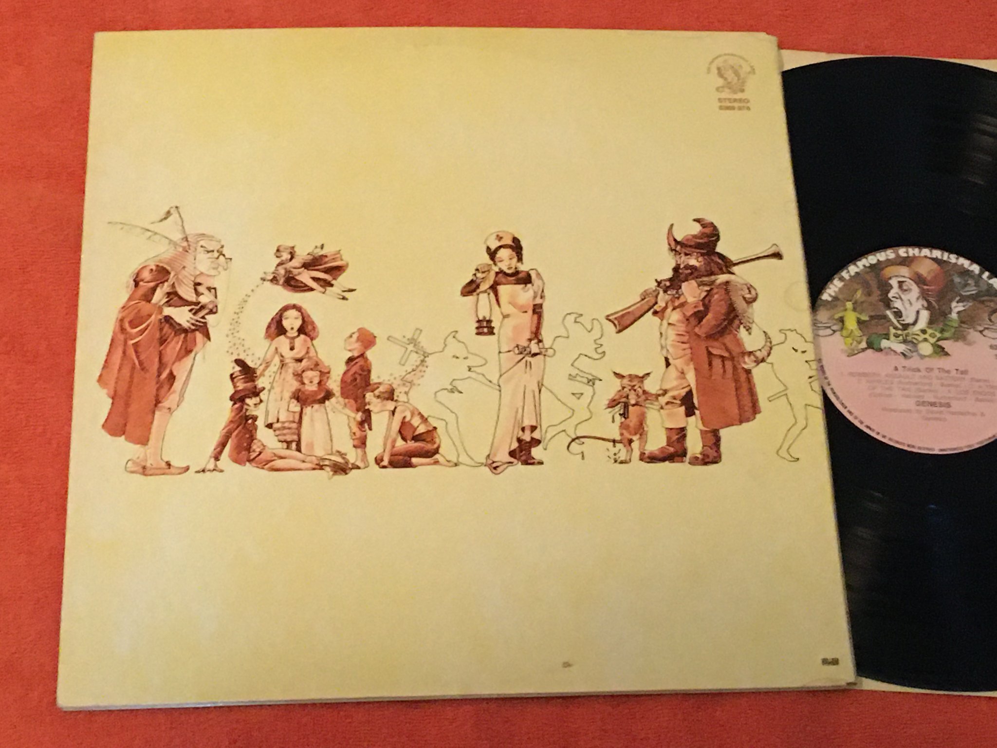 Omslagsbild för skivan GENESIS A TRICK OF THE TAIL LP Swe THE FAMOUS CHARISMA LABEL 6369 974