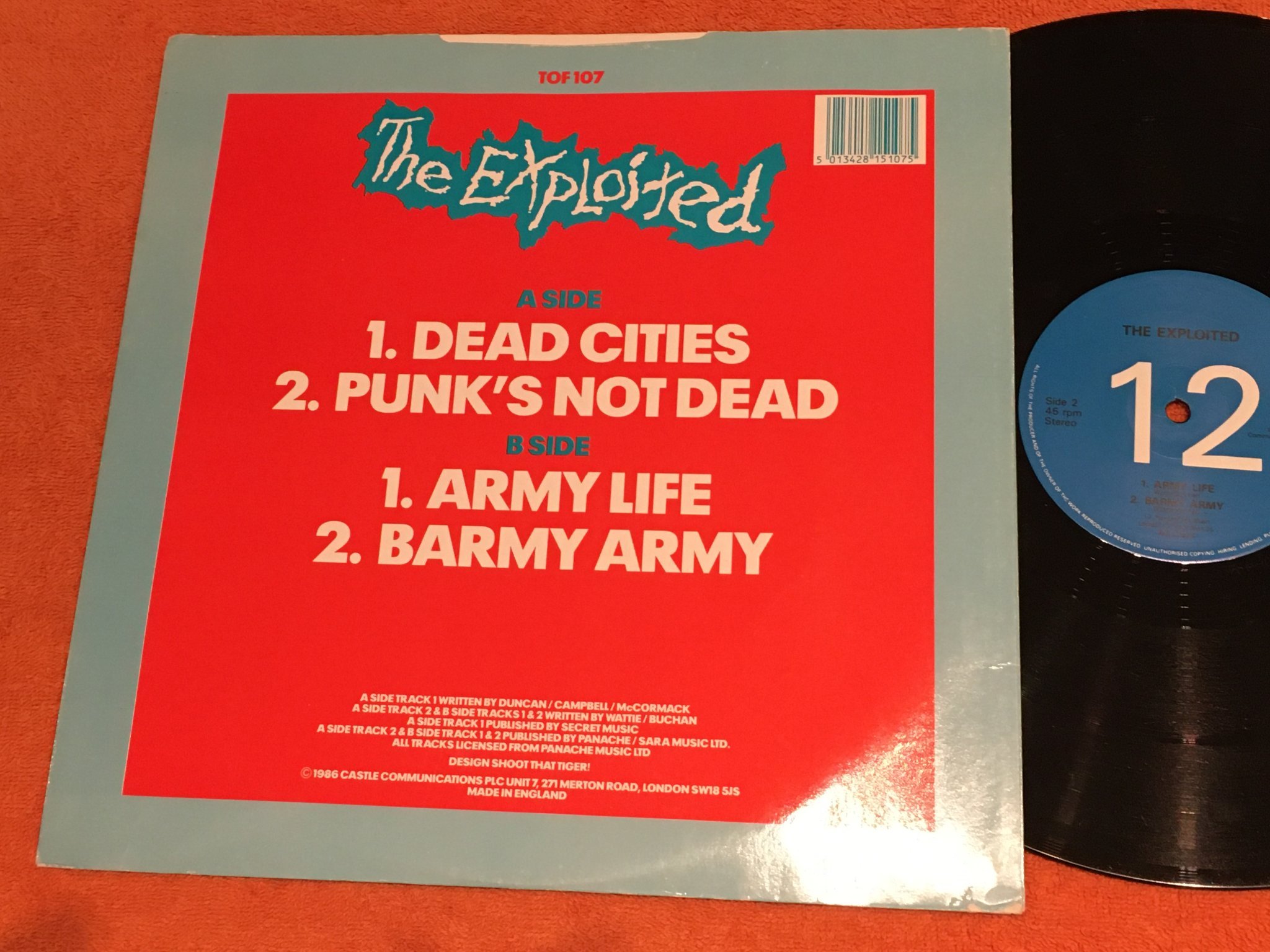 Omslagsbild för skivan THE EXPLOITED dead cities 12"ep -86 UK tof 107