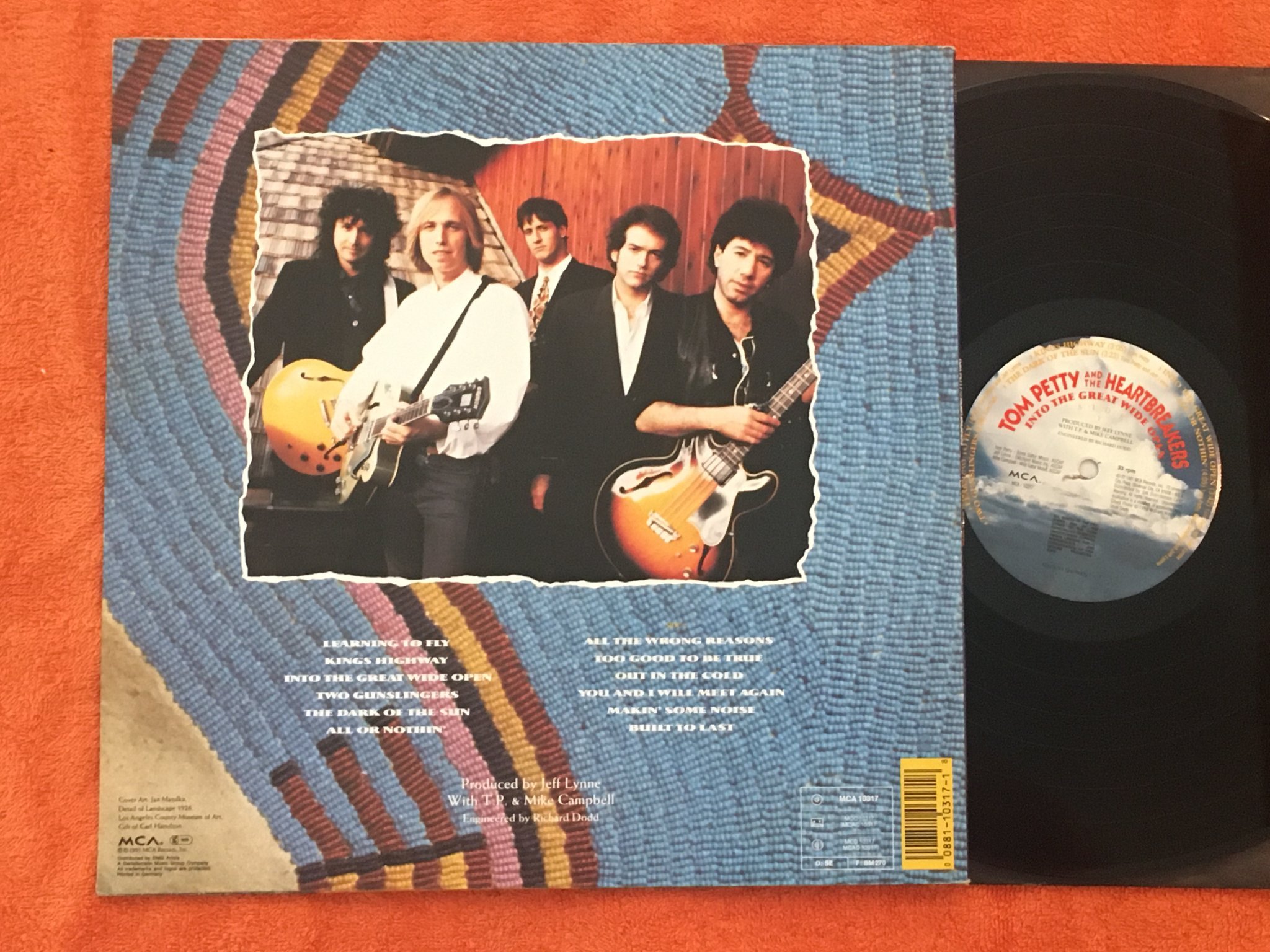 Omslagsbild för skivan TOM PETTY & THE HEARTBREAKERS into the great wide open LP -91 Ger MCA 10317
