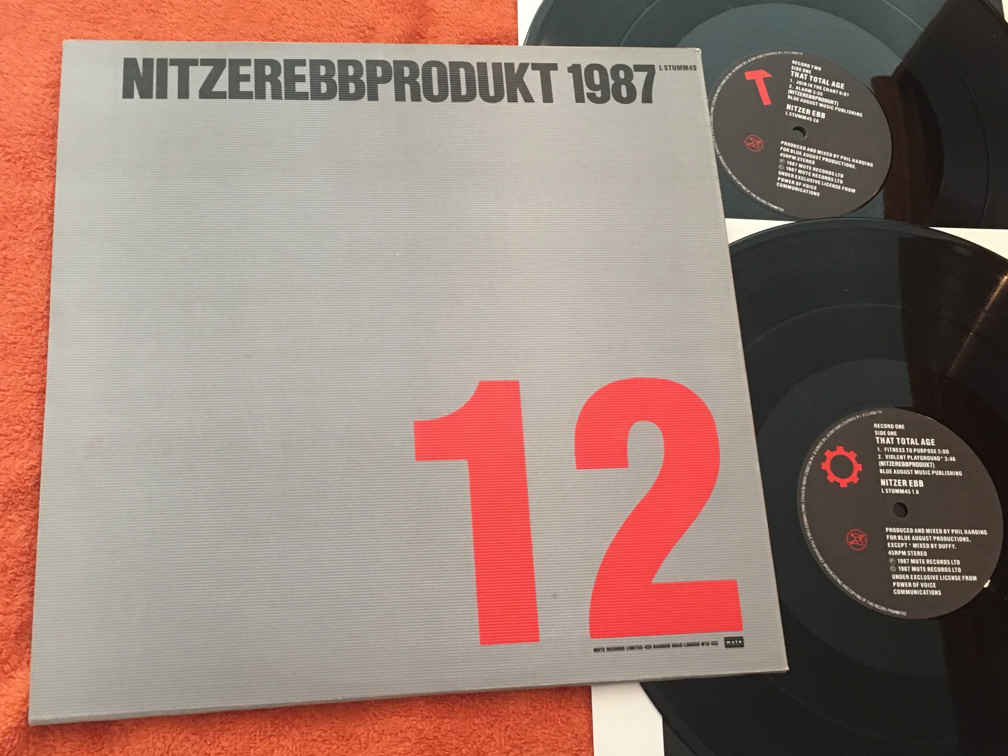 Omslagsbild för skivan NITZER EBB that total age 2xLP -87 UK MUTE LSTUMM 45