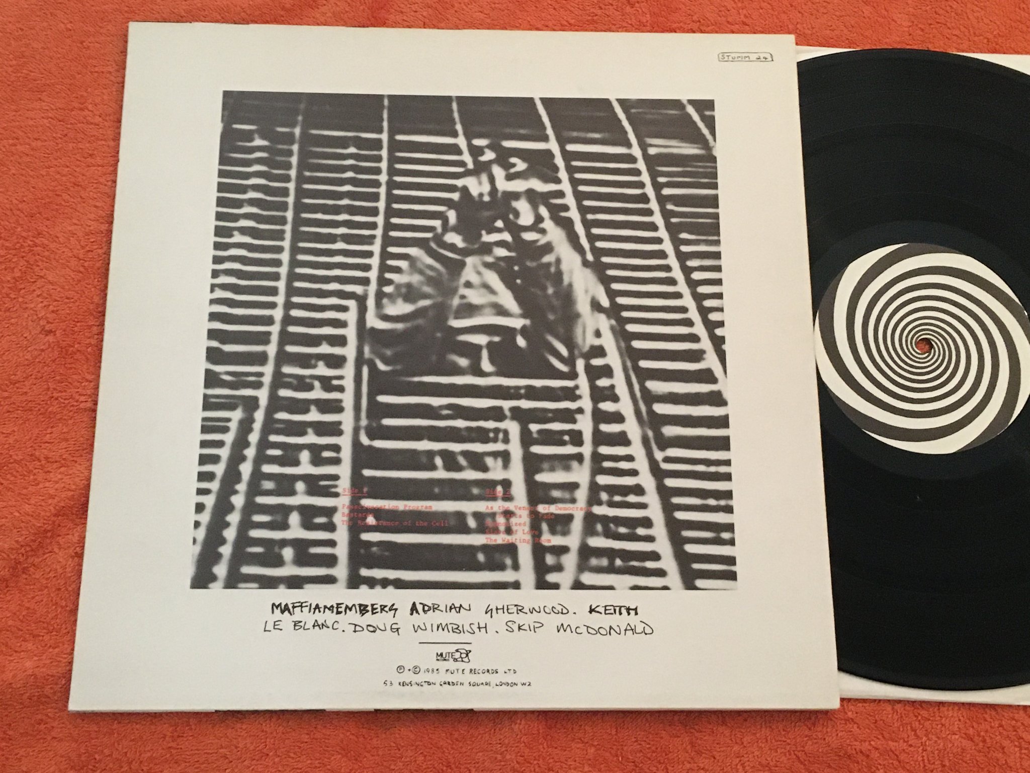 Omslagsbild för skivan MARK STEWART as the veneer of democracy starts to fade LP -85 UK STUMM 24