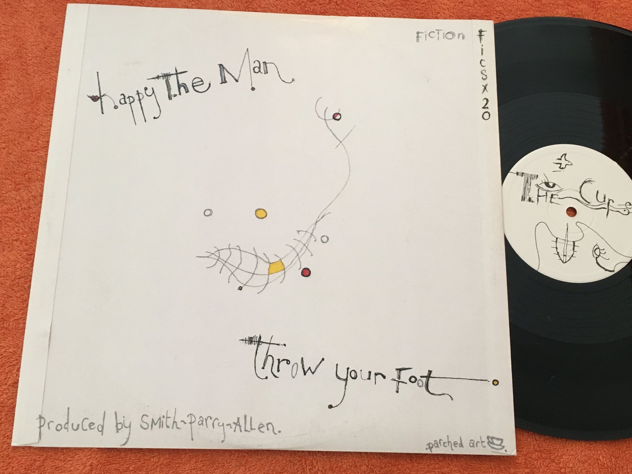 Omslagsbild för skivan THE CURE caterpillar 12"single -84 FICTION FICSX20