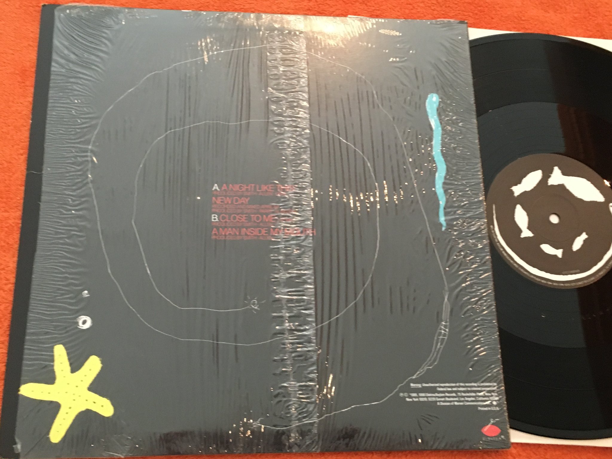 Omslagsbild för skivan THE CURE quadpus 12"EP -86 US ELEKTRA 0-66856