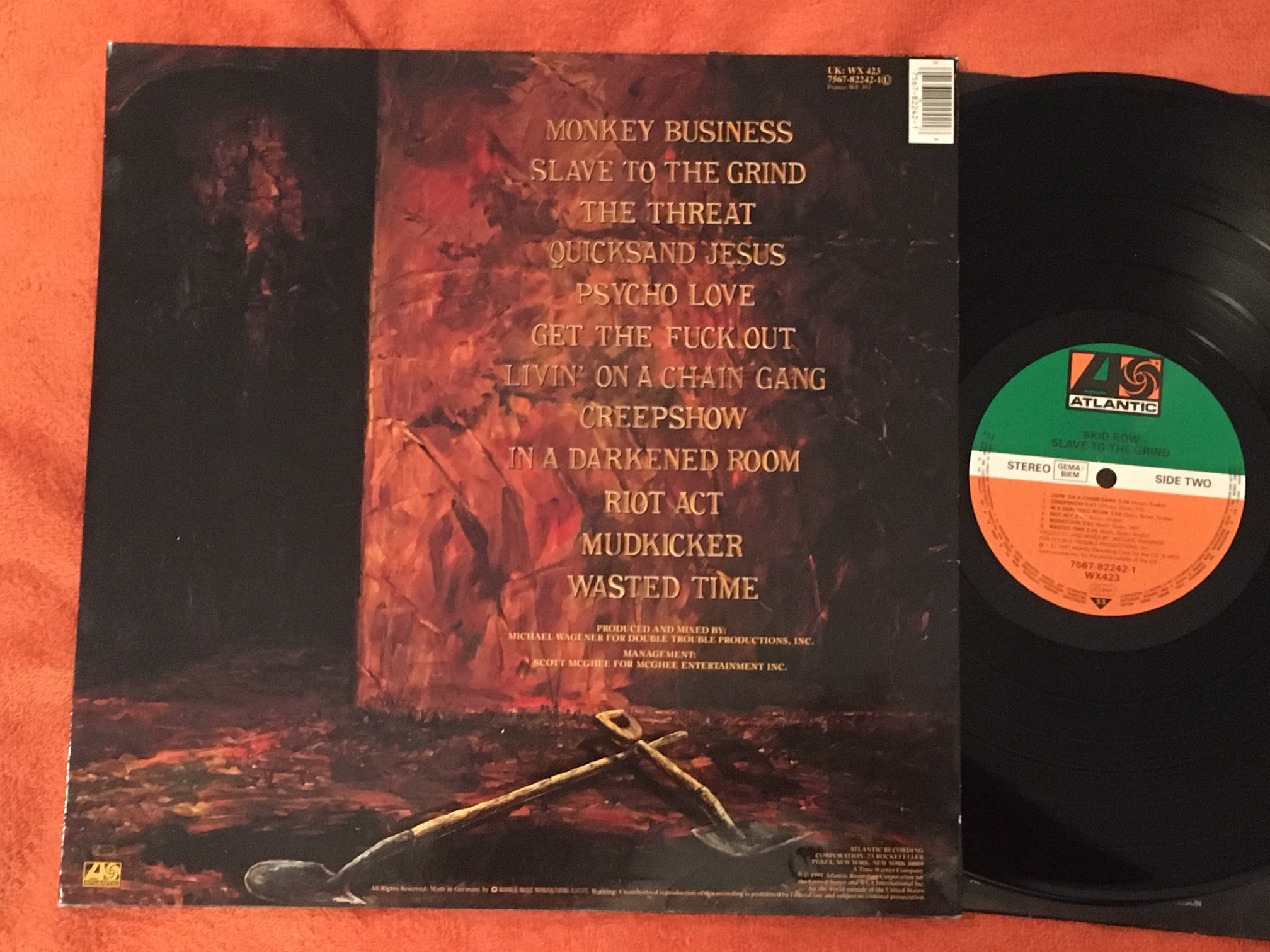 Omslagsbild för skivan SKID ROW slave to the grind LP -91 Hol ATLANTIC 7567-82242-1