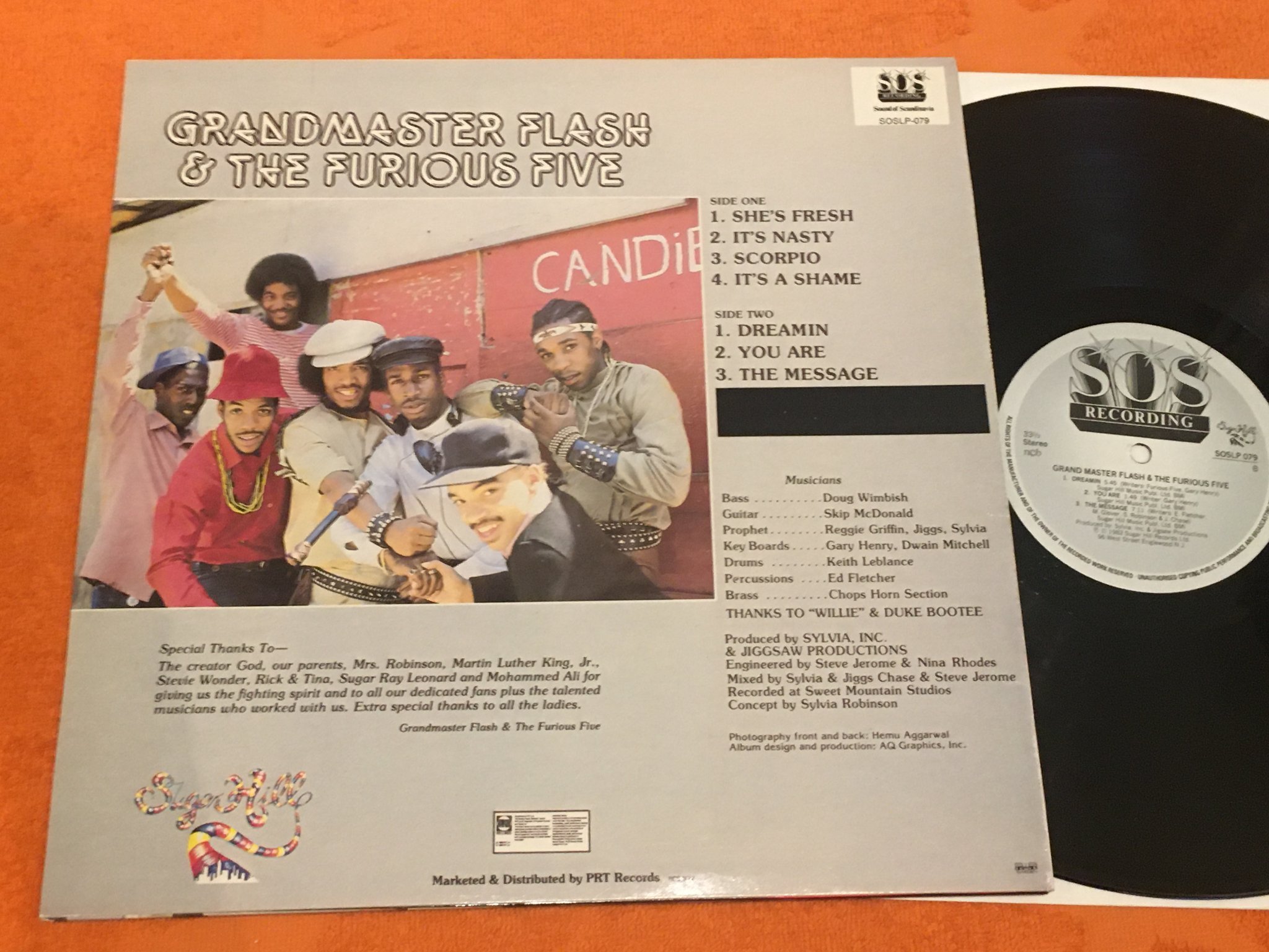 Omslagsbild för skivan GRAND MASTER FLASH & THE FURIOUS 5 the message LP -82 SOS RECORDING  SOSLP 079