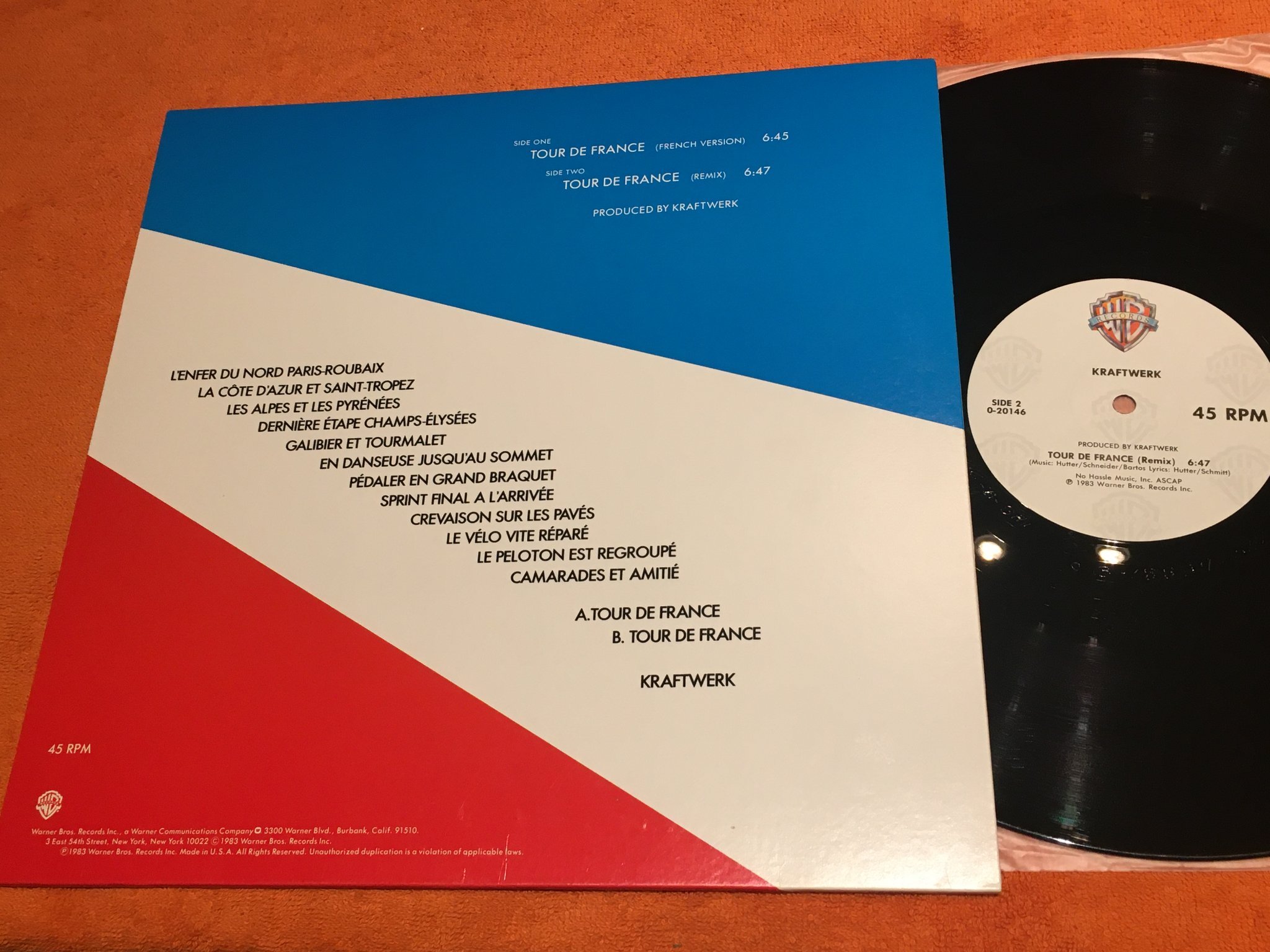 Omslagsbild för skivan KRAFTWERK tour de france 12"single 83 WARNER BROS 0-20146 promo stamp