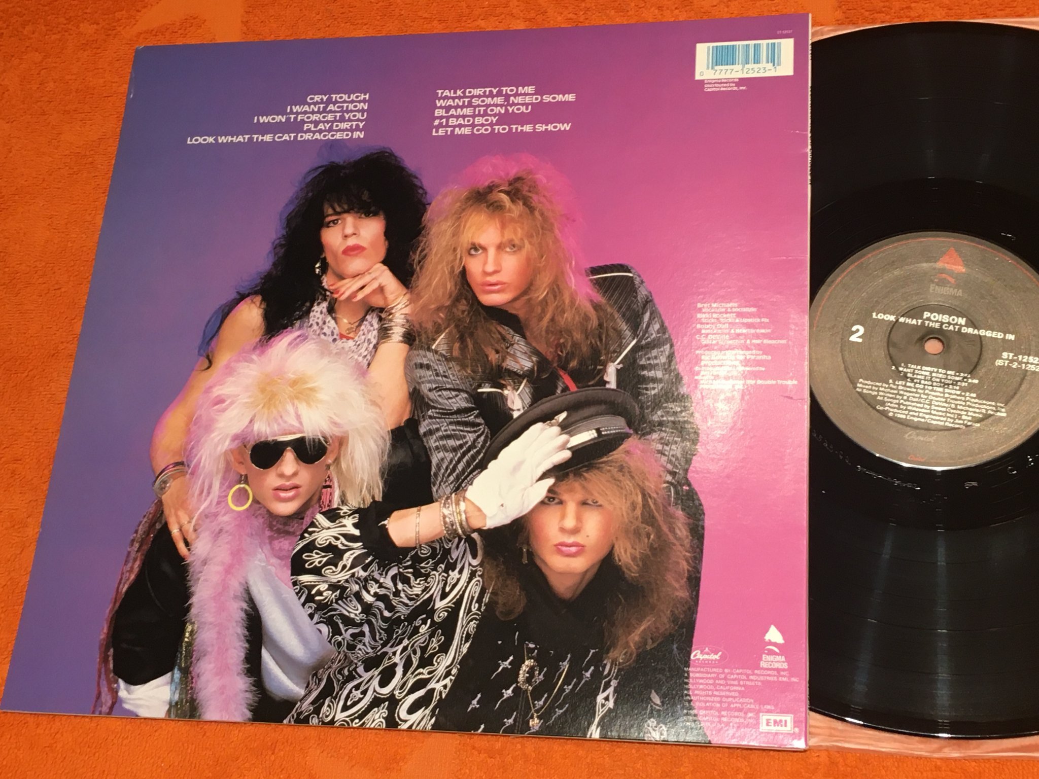 Omslagsbild för skivan POISON look what the cat dragged in LP -86 US ENIGMA ST-12523