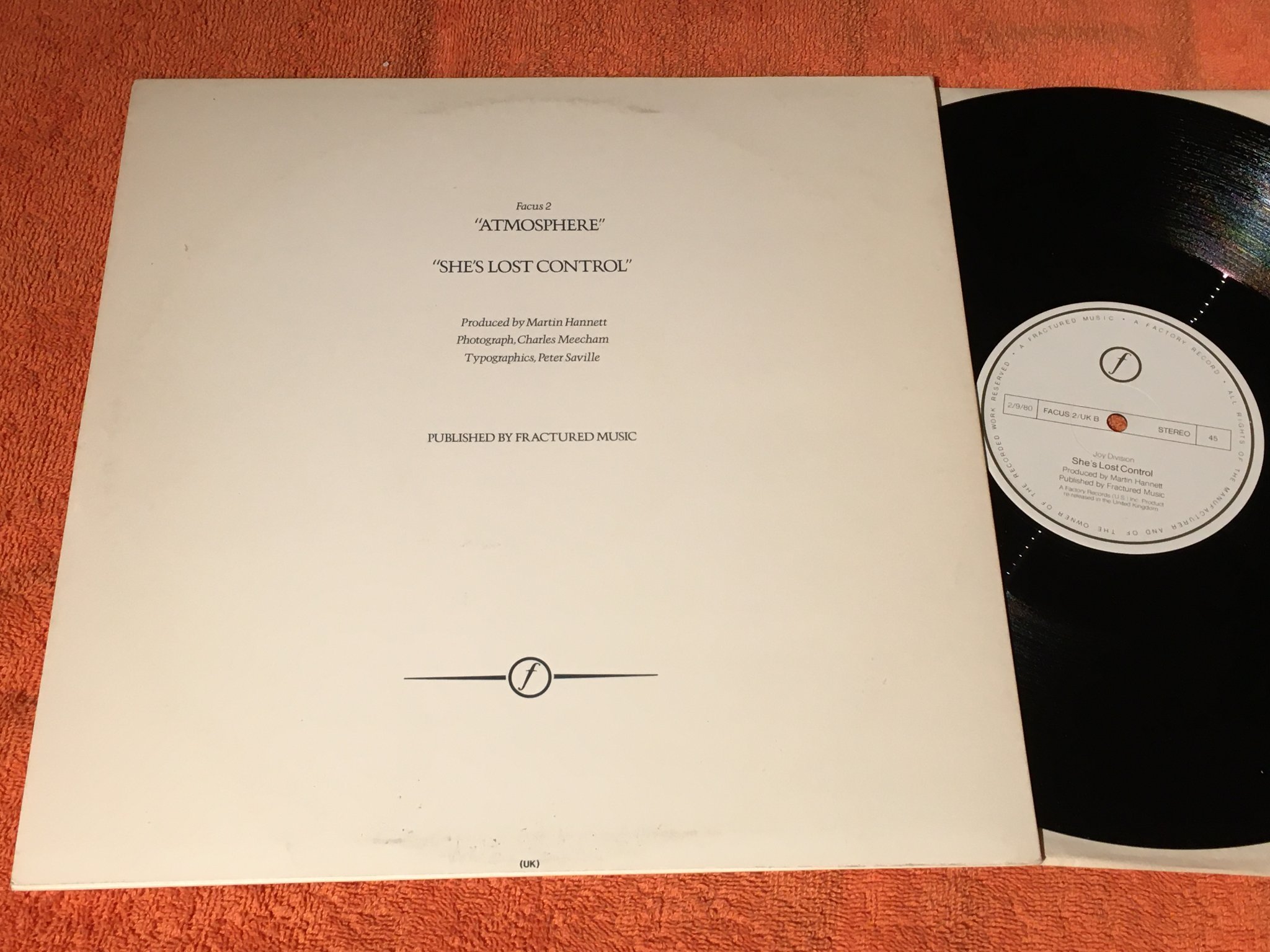 Omslagsbild för skivan JOY DIVISION atmosphere 12”single -80 UK FACTORY FACUS 2 Dark red Translucent  R