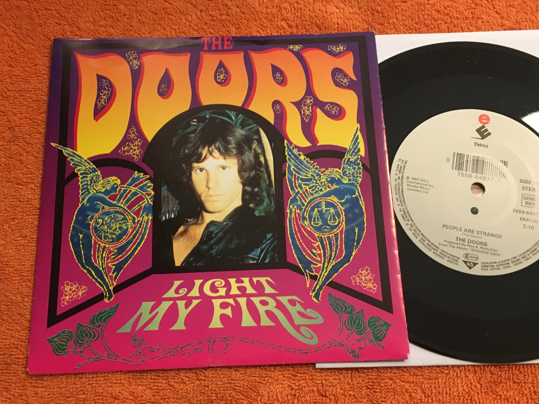 Omslagsbild för skivan THE DOORS light my fire 7"single ELEKTRA 7559-64877-7