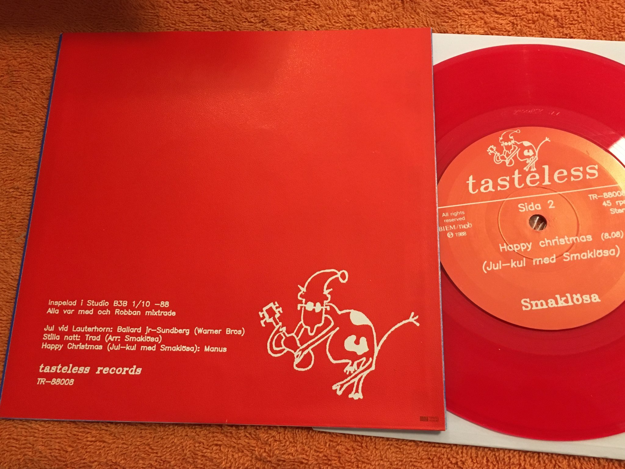 Omslagsbild för skivan SMAKLÖSA Jul Med Smaklösa 7" -88 Swe TASTELESS TR-88008 w/ all inserts