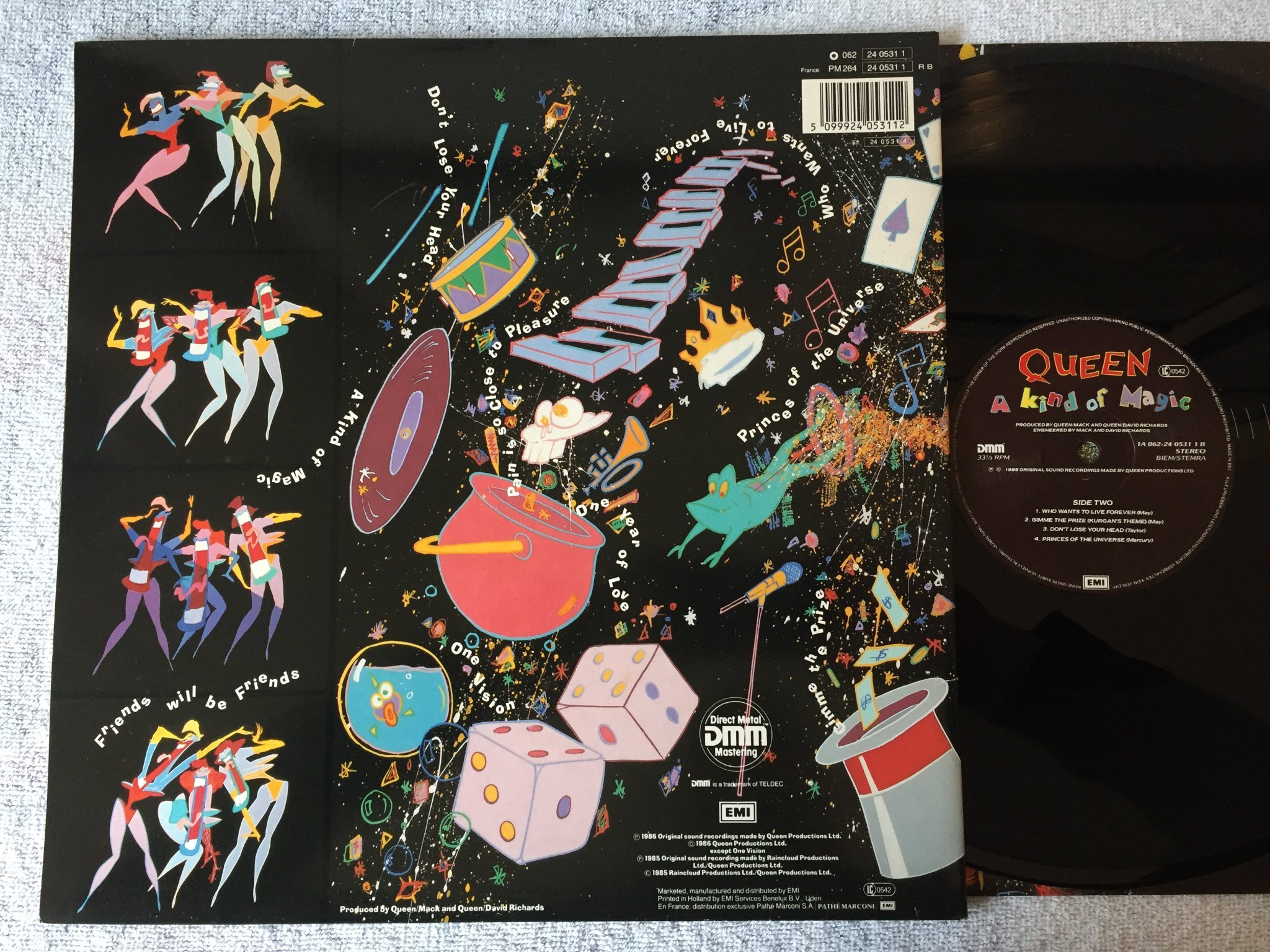 Omslagsbild för skivan QUEEN a kind of magic LP -85 Ger EMI 1A 062-240531 1
