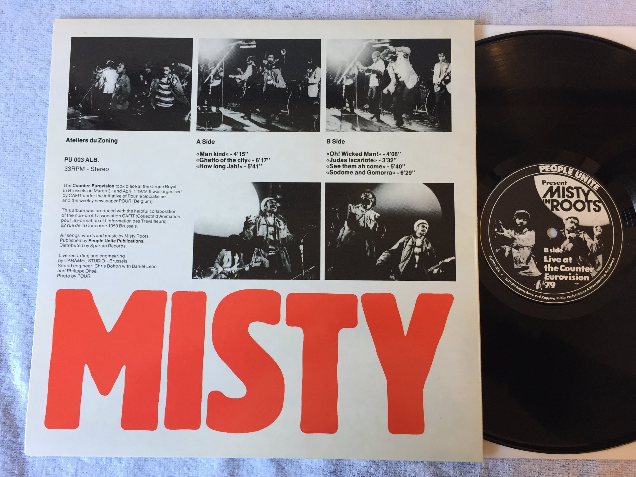 Omslagsbild för skivan MISTY IN ROOTS LIVE AT THE COUNTER EUROVISION 79 LP UK PEOPLE UNITE PU 003 ALB