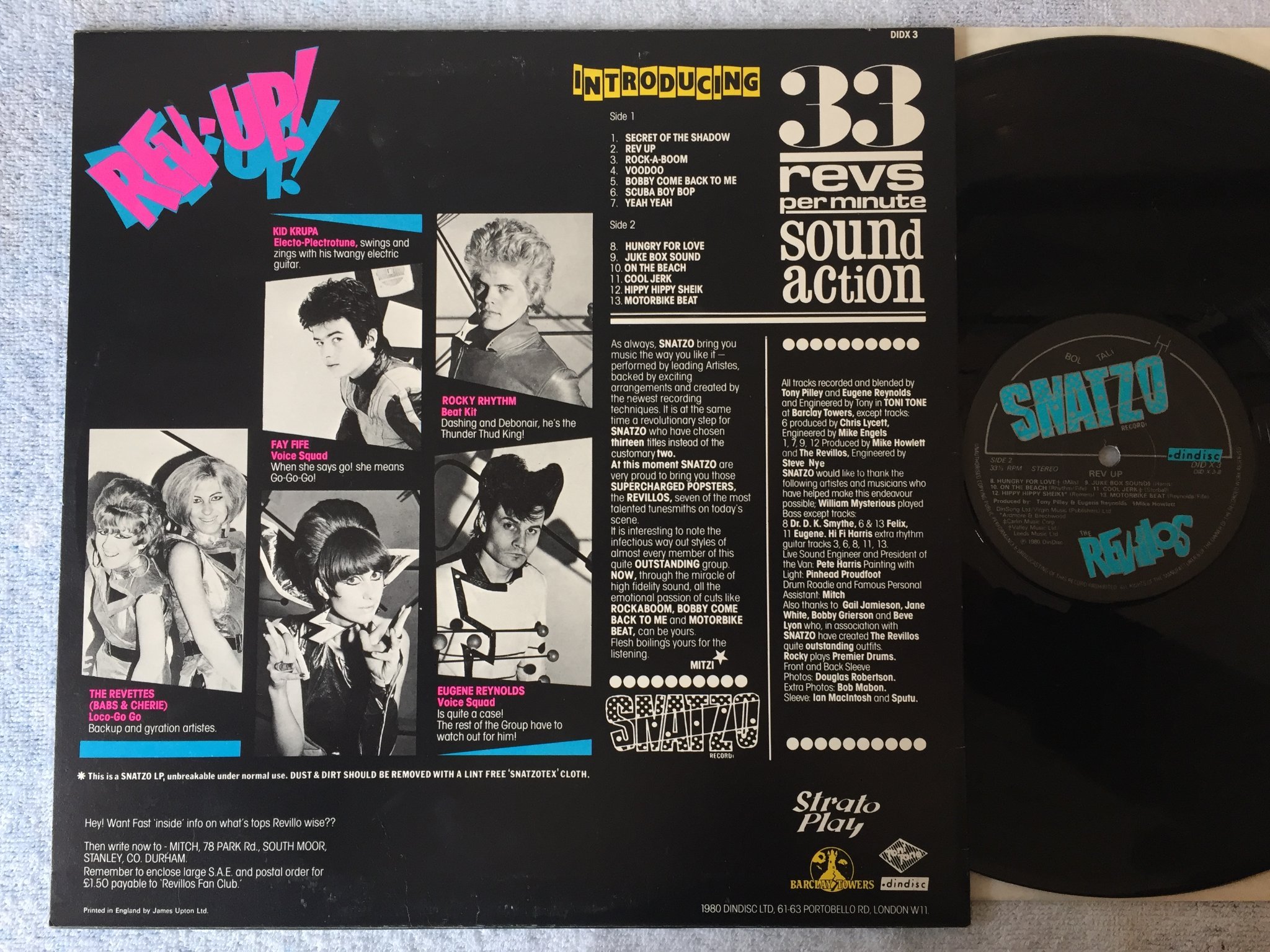Omslagsbild för skivan THE REVILLOS rev up LP -80 DINDISC DID X3