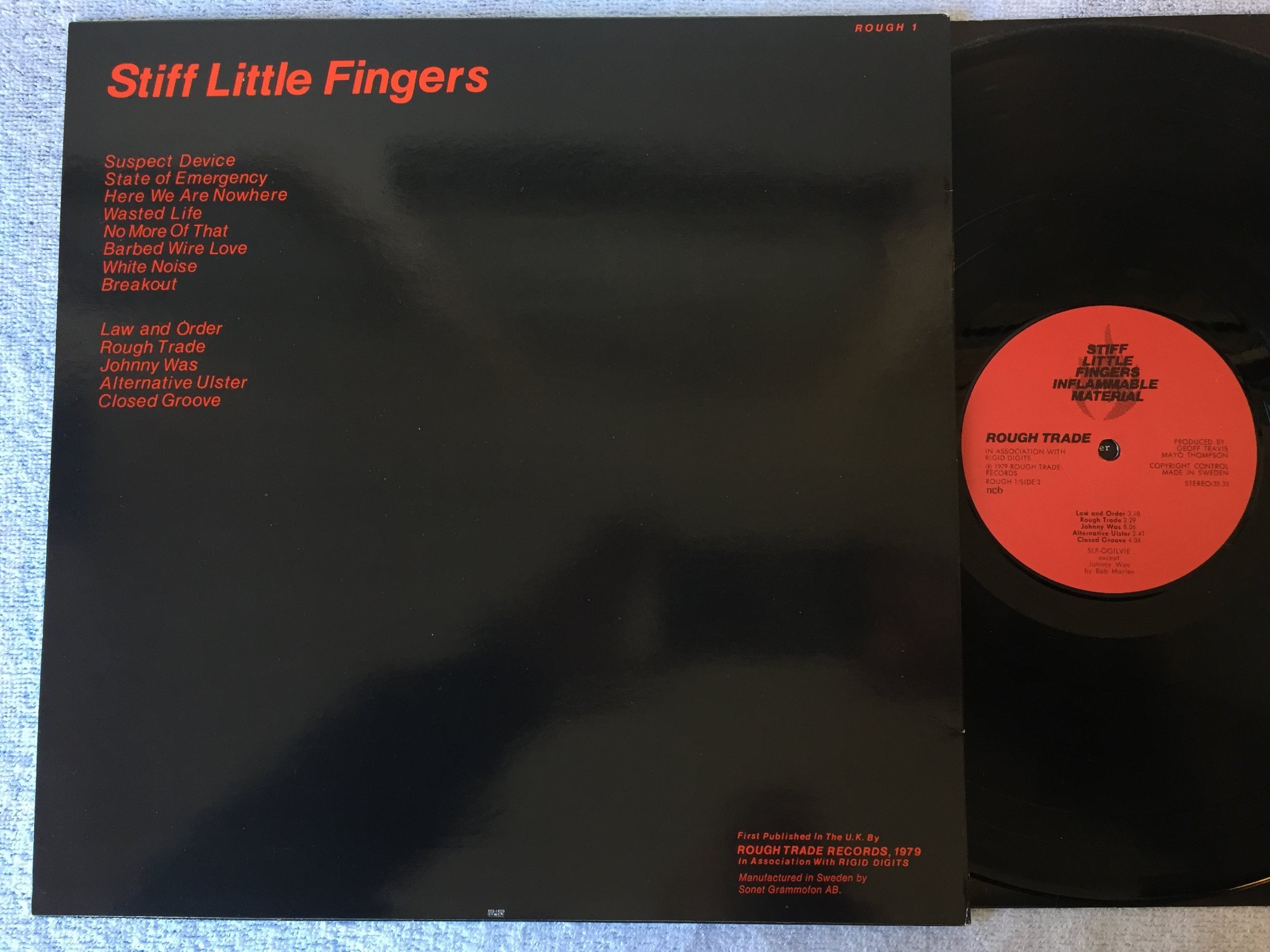 Omslagsbild för skivan STIFF LITTLE FINGERS inflammable material LP -79 ROUGH TRADE ROUGH 1?