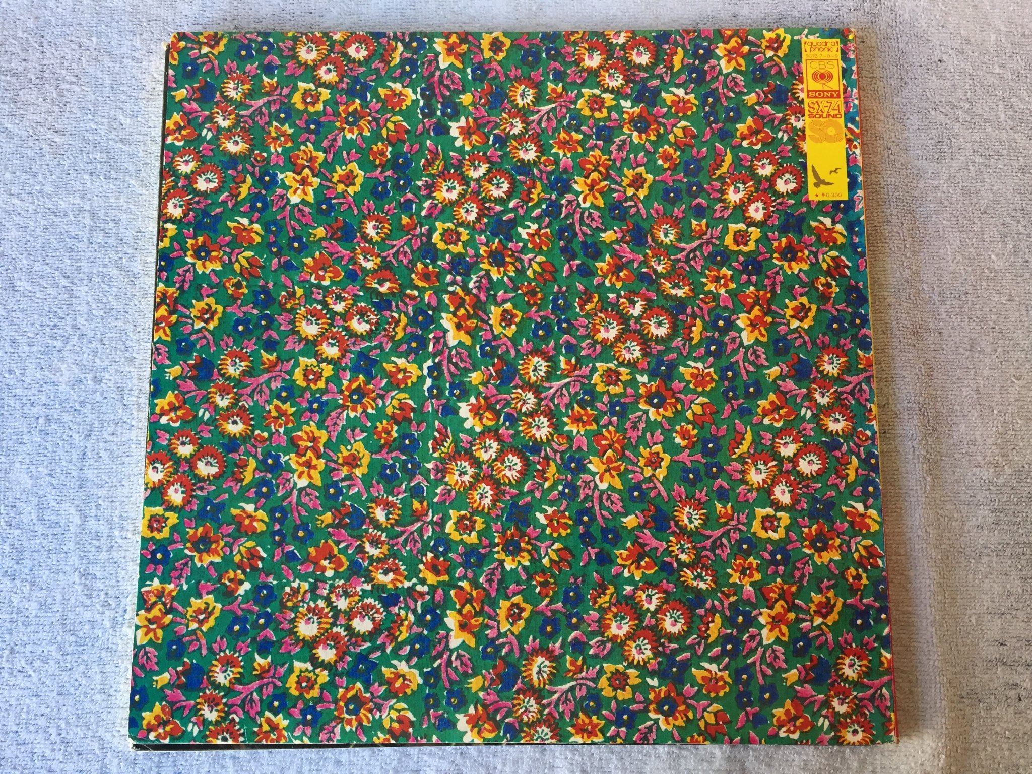 Omslagsbild för skivan SANTANA lotus 3xLP -74 Japan CBS/SONY SOPZ 7-8-9 Quadraphonic