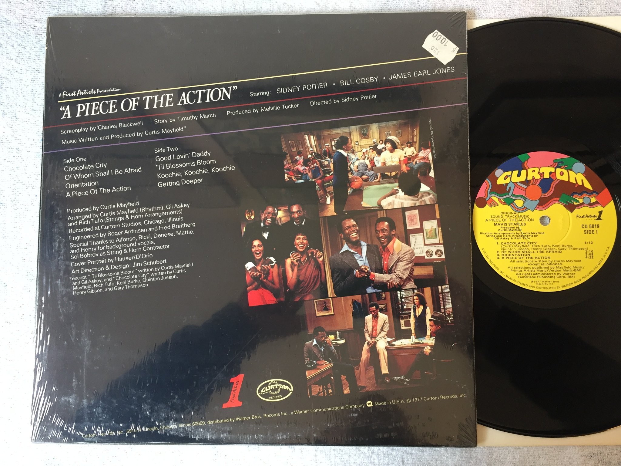 Omslagsbild för skivan MAVIS STAPLES a piece of the action LP -77 US CURTOM produced by Curtis Mayfield