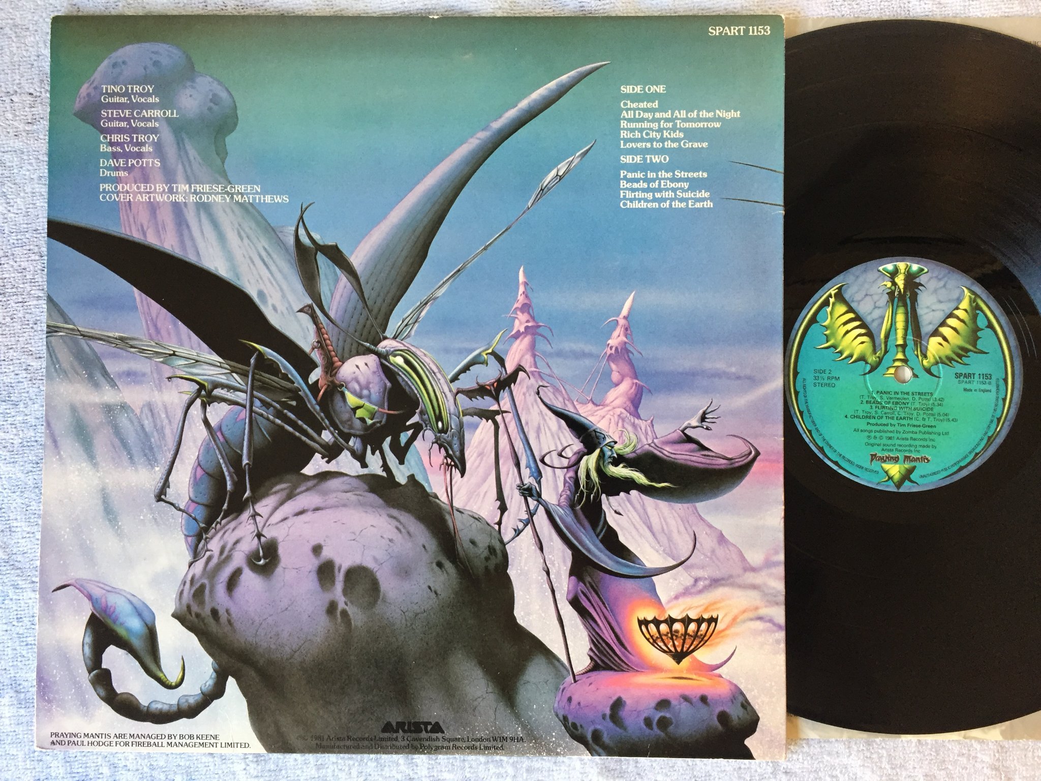 Omslagsbild för skivan PRAYING MANTIS time tells no lies LP -81 UK ARISTA SPART 1153 
