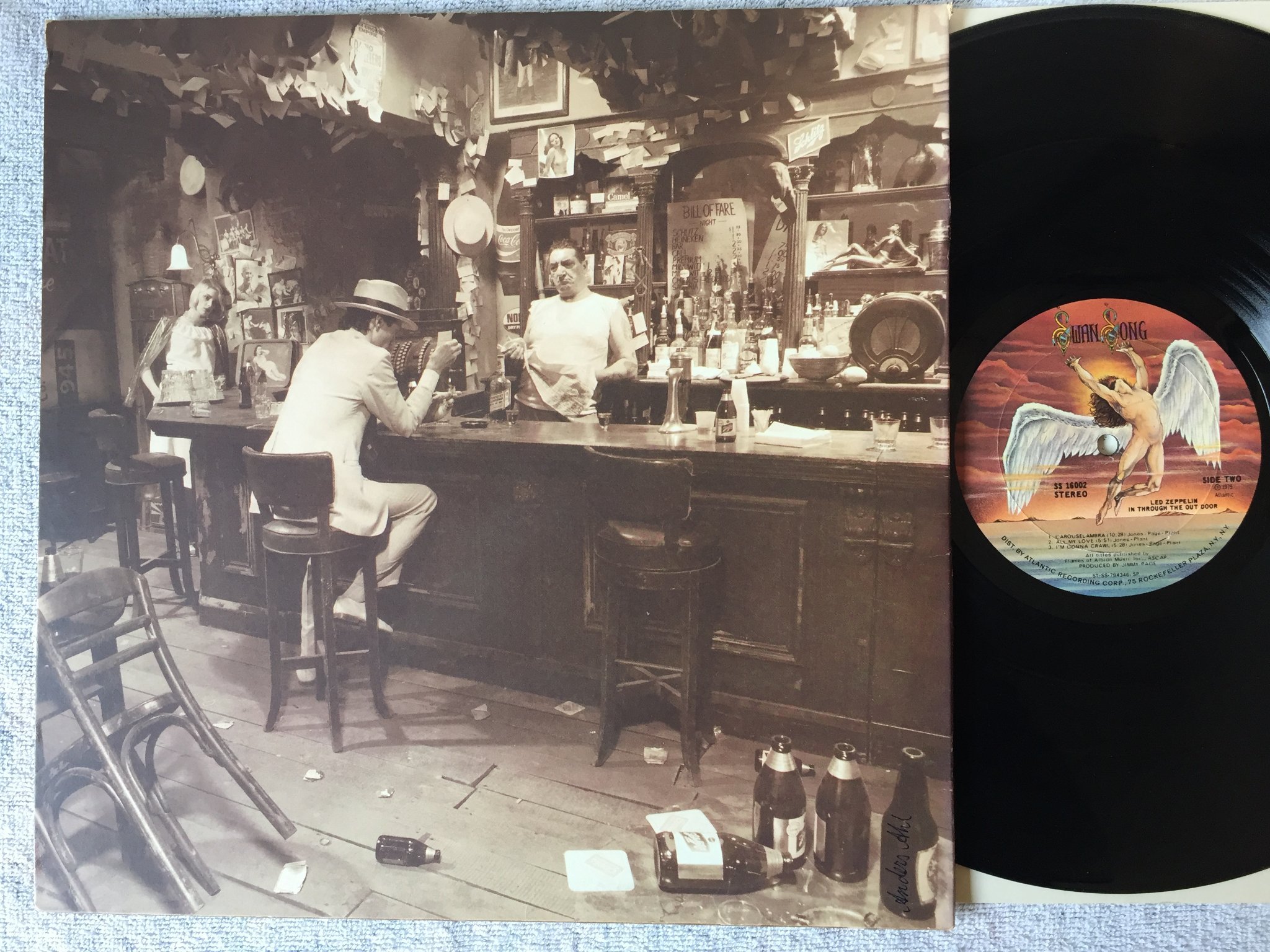 Omslagsbild för skivan LED ZEPPELIN in through the out door LP -79 US SWAN SONG SS 16002 "C" COVER