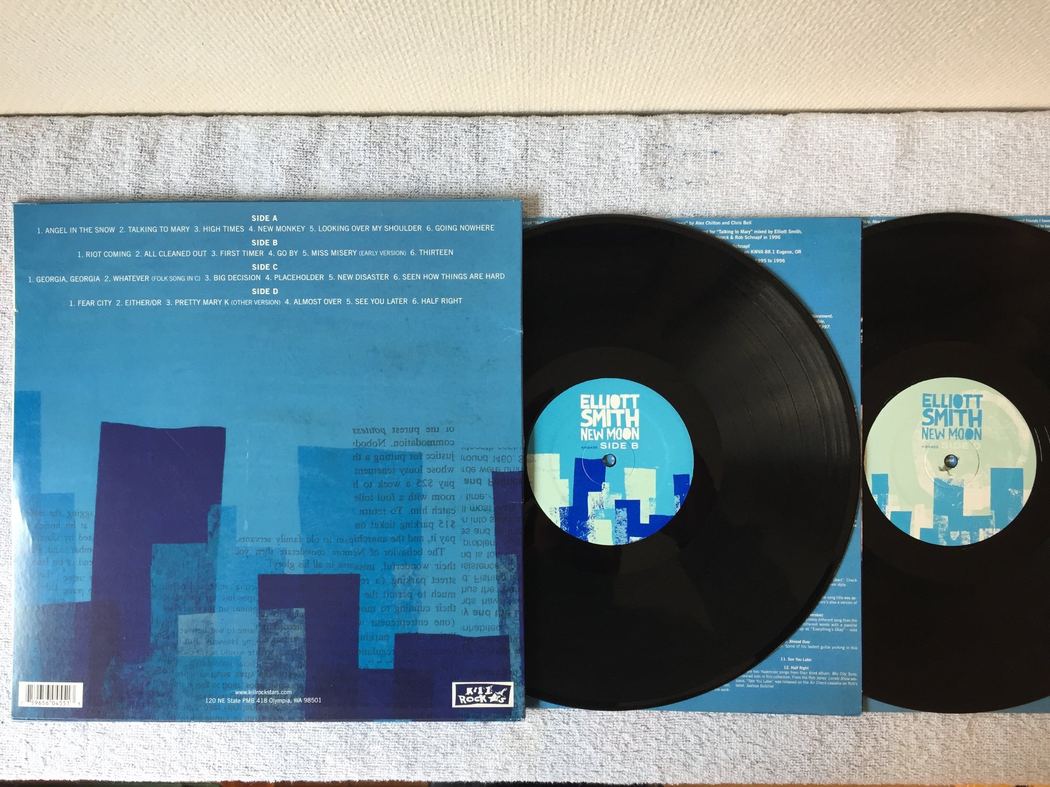 Omslagsbild för skivan ELLIOTT SMITH new moon 2xLP 2007 US KILL ROCK STARS KRS455