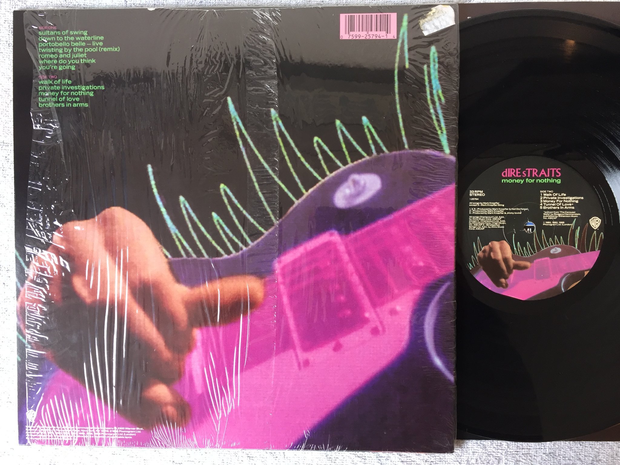 Omslagsbild för skivan DIRE STRAITS money for nothing LP -88 US WARNER 1-25794 hyper sticker