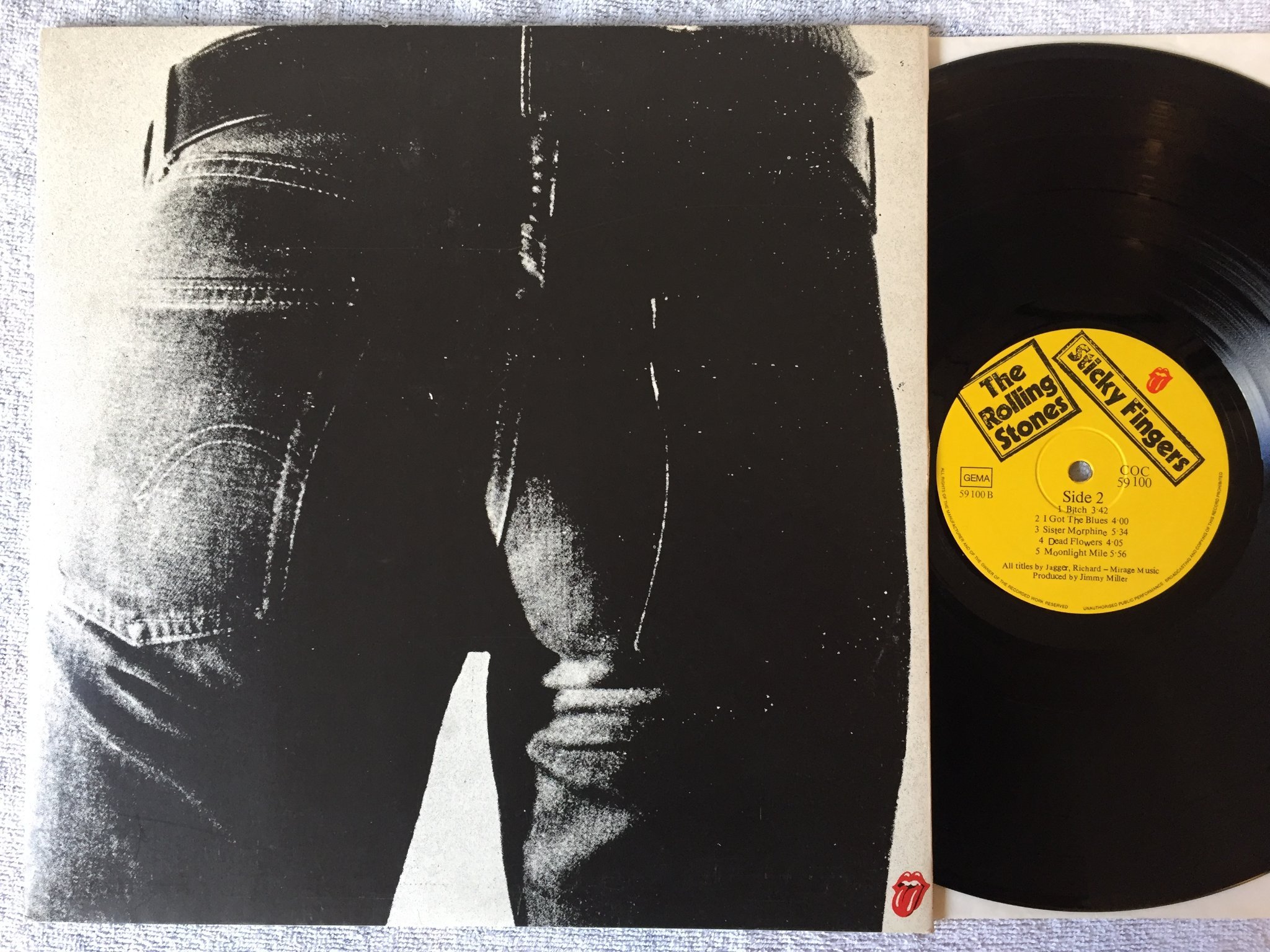 Omslagsbild för skivan THE ROLLING STONES sticky fingers LP Ger ZIPPER COVER Andy Warhol cover art