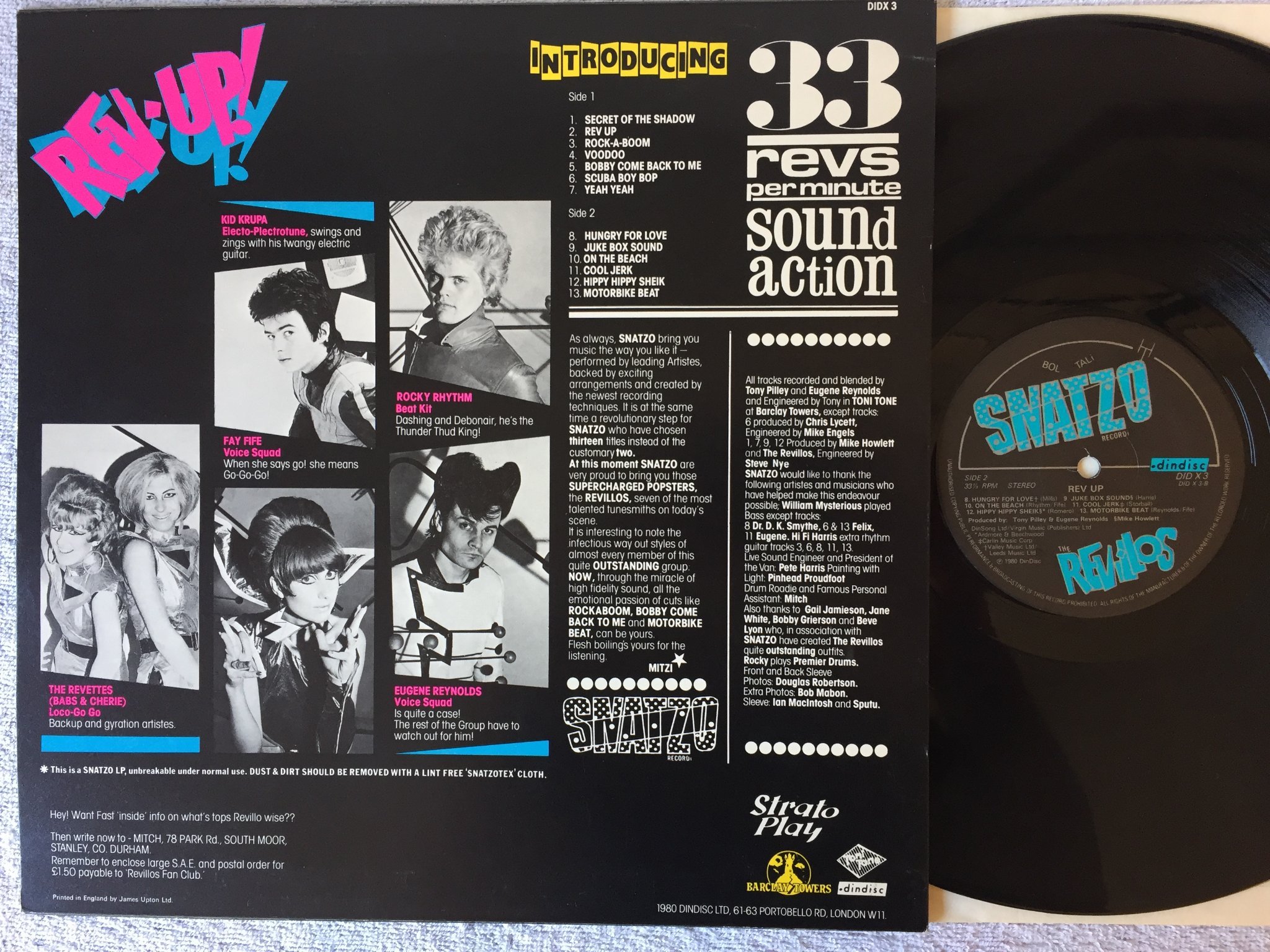 Omslagsbild för skivan THE REVILLOS rev up LP -80 UK DINDISC DIDX3