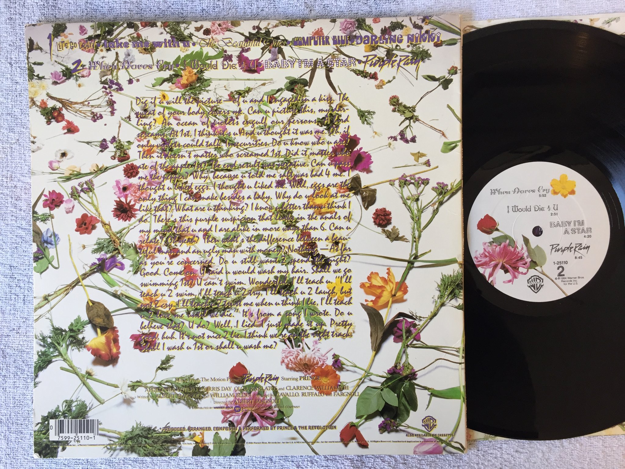 Omslagsbild för skivan PRINCE purple rain LP -84 US PAISLEY PARK 1-25110 + POSTER 