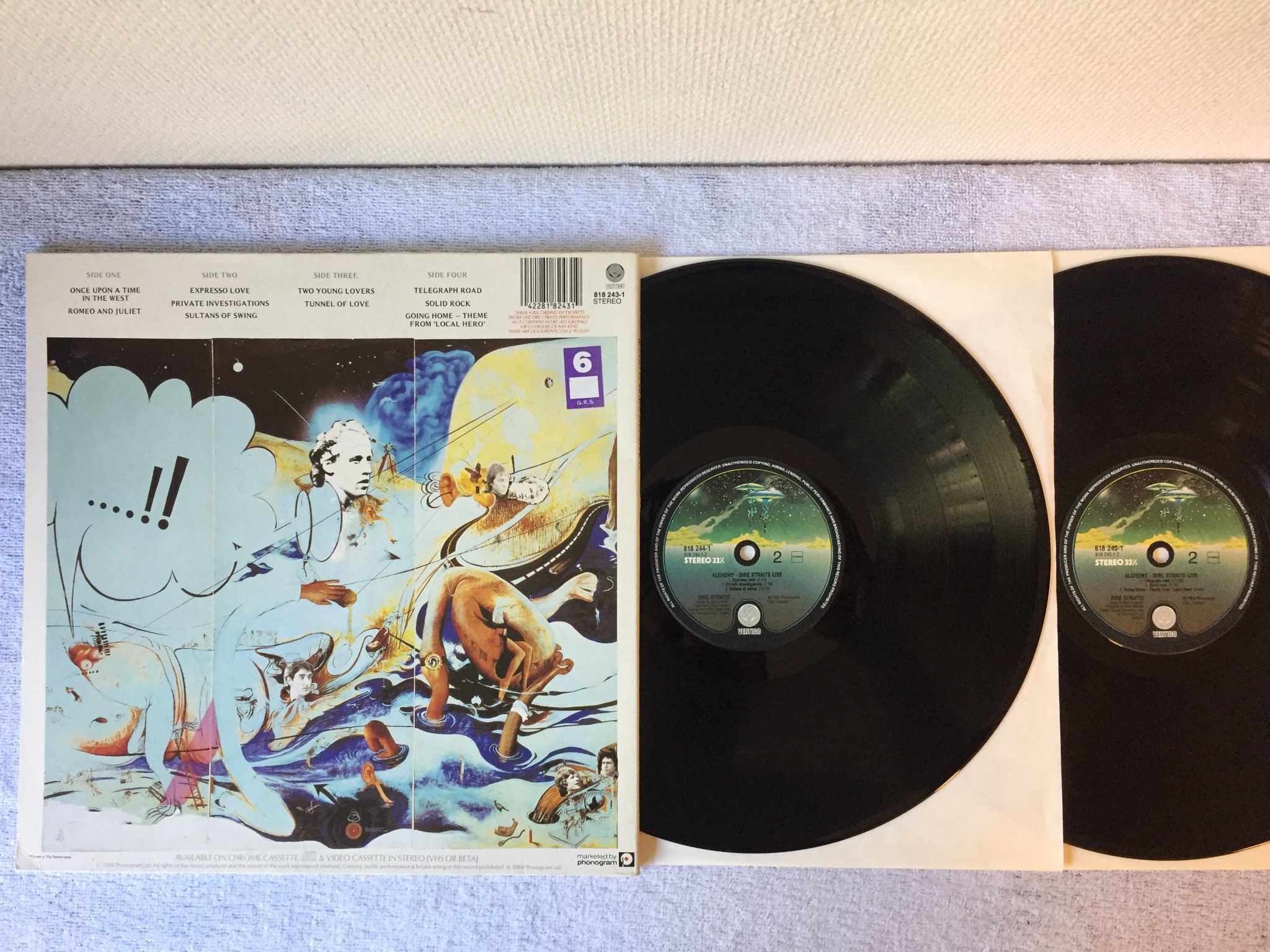 Omslagsbild för skivan DIRE STRAITS alchemy - live 2xLP -84 VERTIGO 818244-1