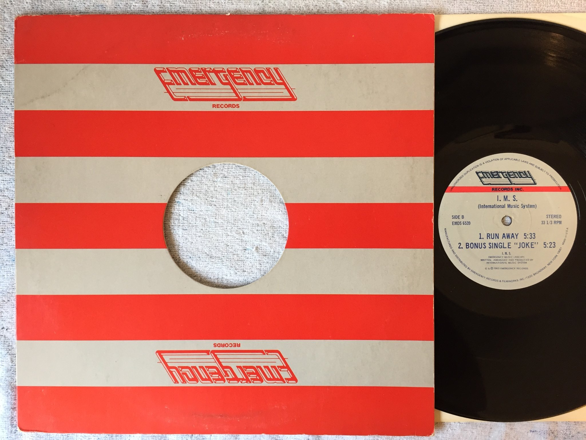 Omslagsbild för skivan INTERNATIONAL MUSIC SYSTEM nonline 12"single -83 US EMERGENCY EMDS 6539 