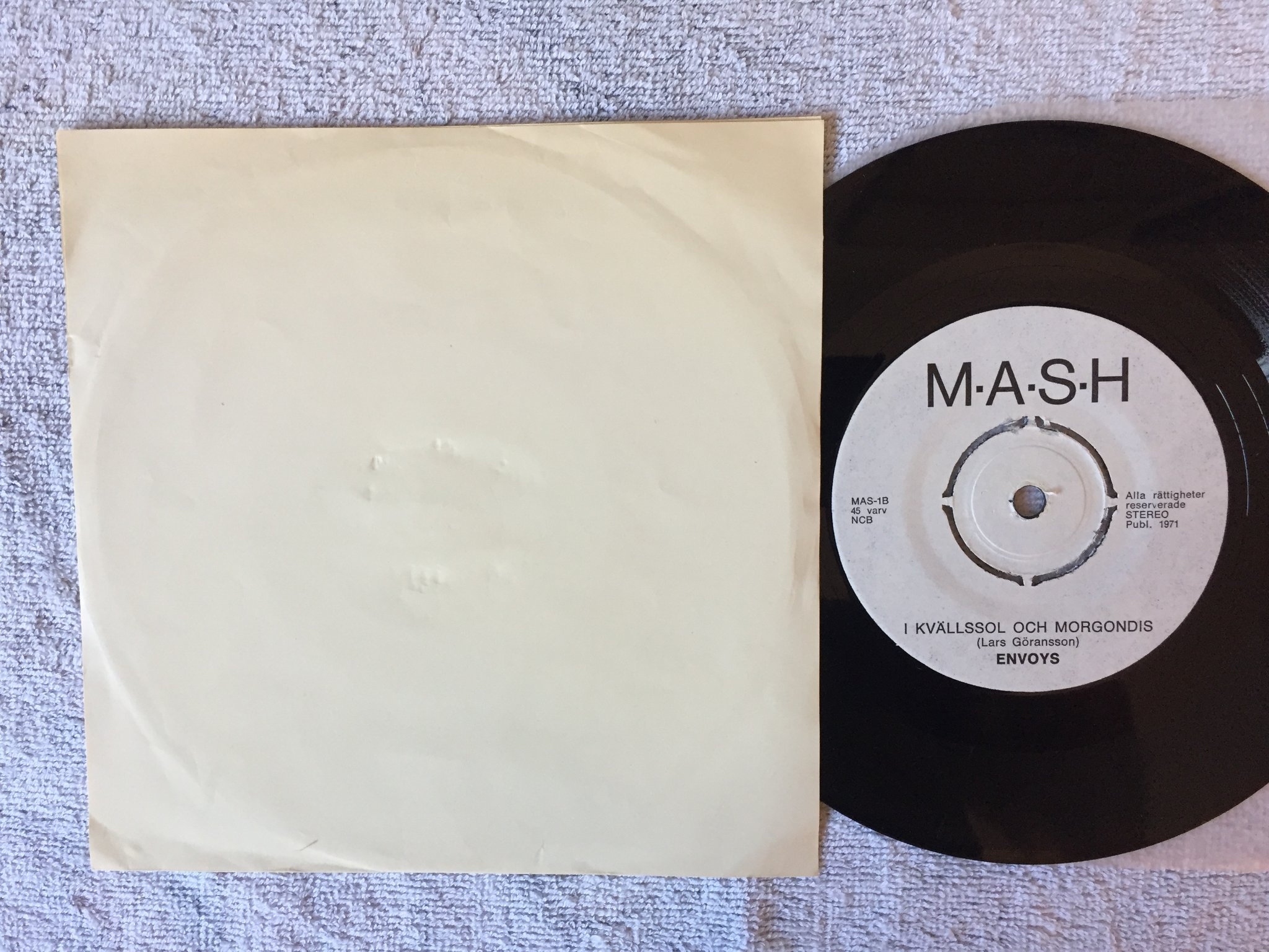 Omslagsbild för skivan ENVOYS almarna åt folket 7"single -71 MASH MAS-1 