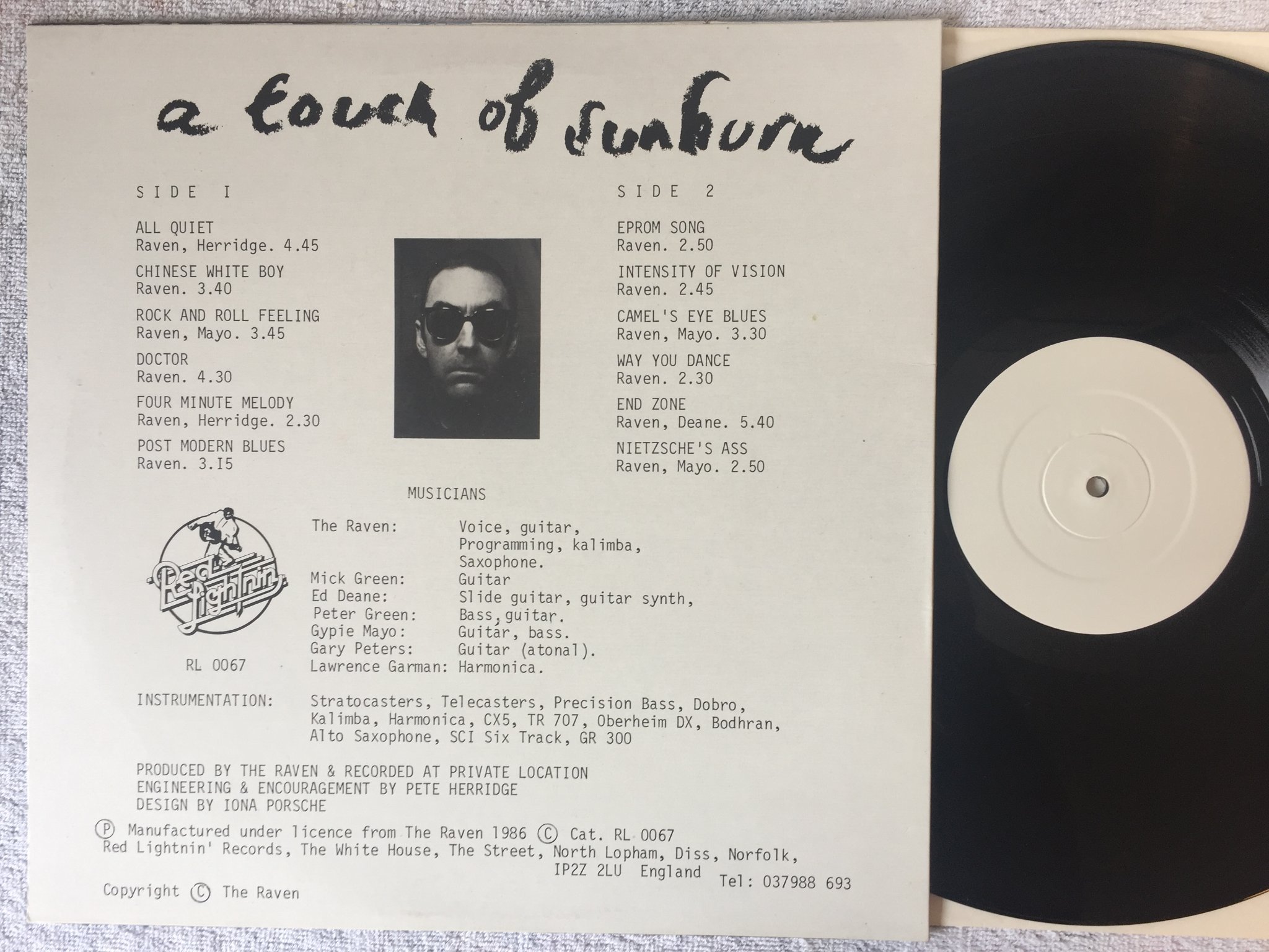 Omslagsbild för skivan THE ENEMY WITHIN A Touch Of Sunburn LP -86 UK white label RED LIGHTNIN RL 0067 