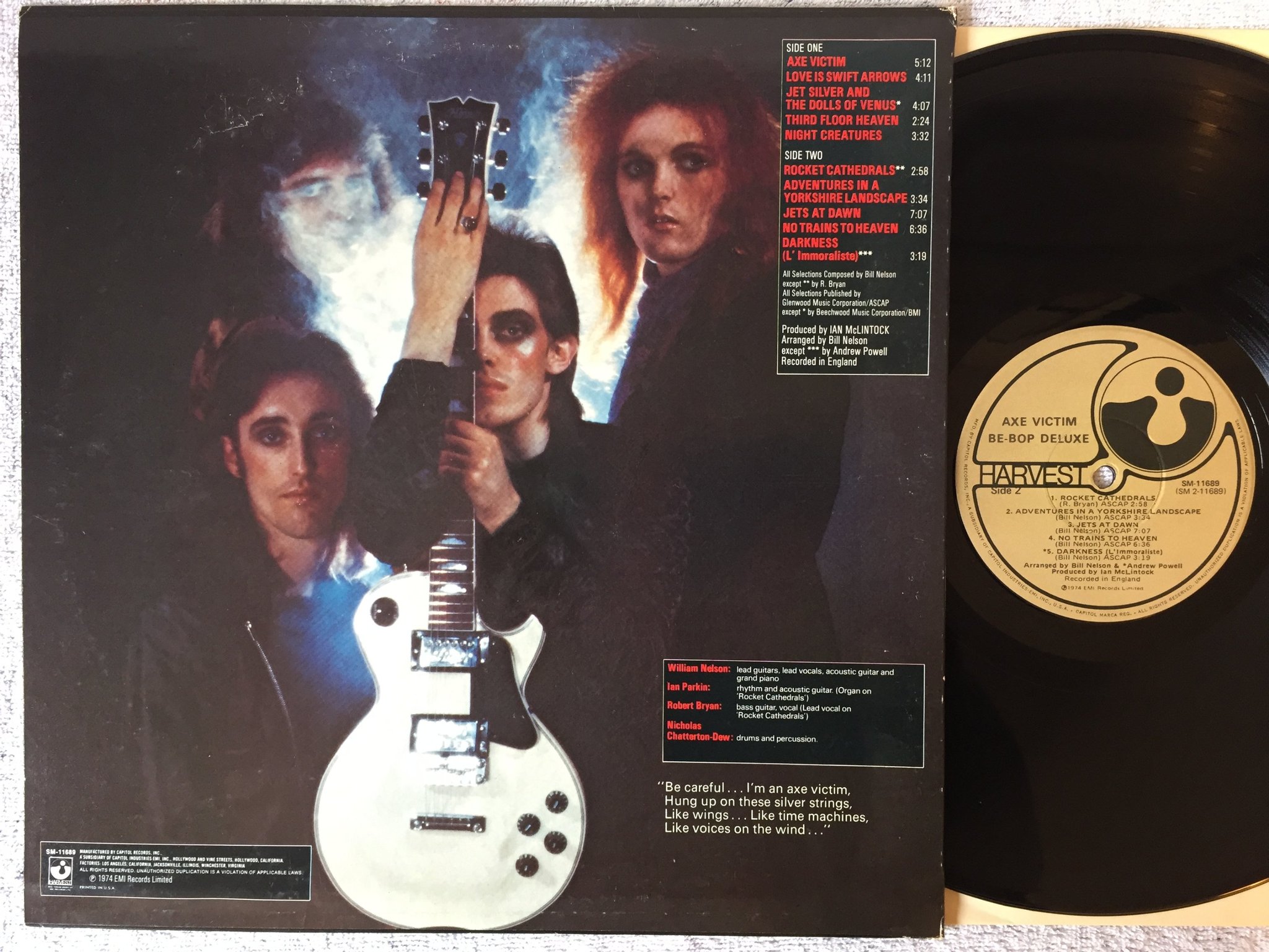 Omslagsbild för skivan BE-BOP DELUXE axe victim LP -74 US HARVEST SM-11689 