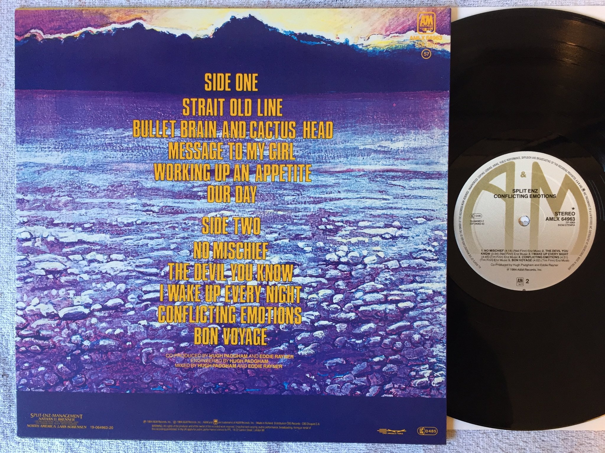 Omslagsbild för skivan SPLIT ENZ conflicting emotions LP -84 A&M AMLX 64963 