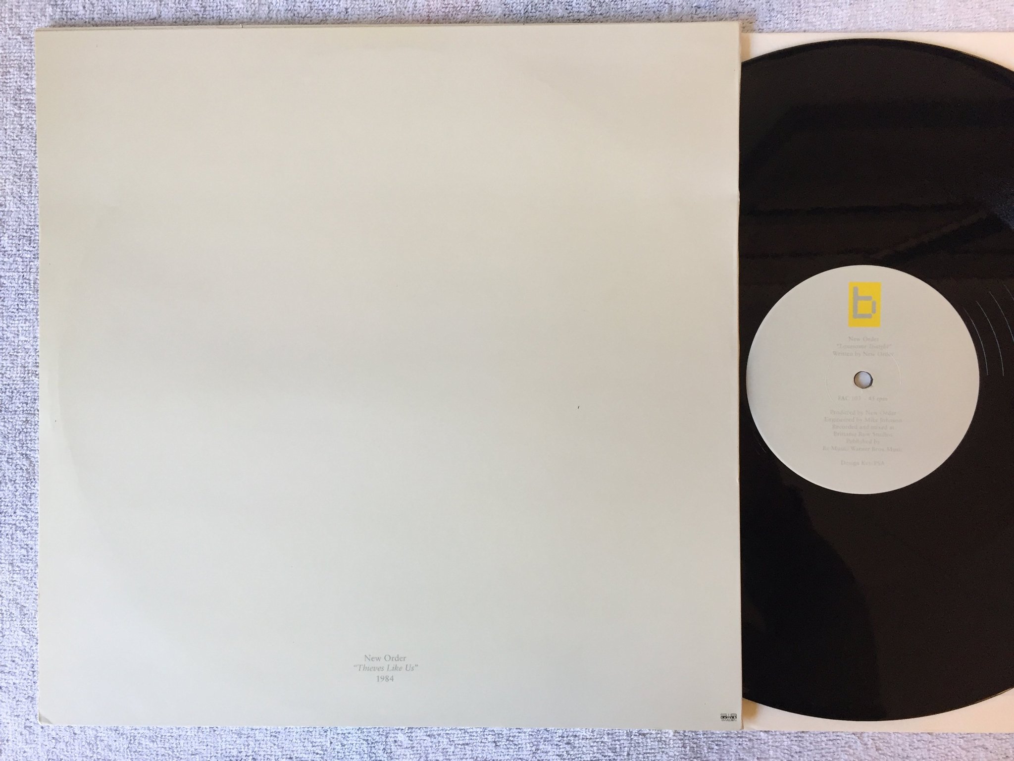 Omslagsbild för skivan NEW ORDER Thieves Like Us 12"single -84 Swe FACTORY FAC 103