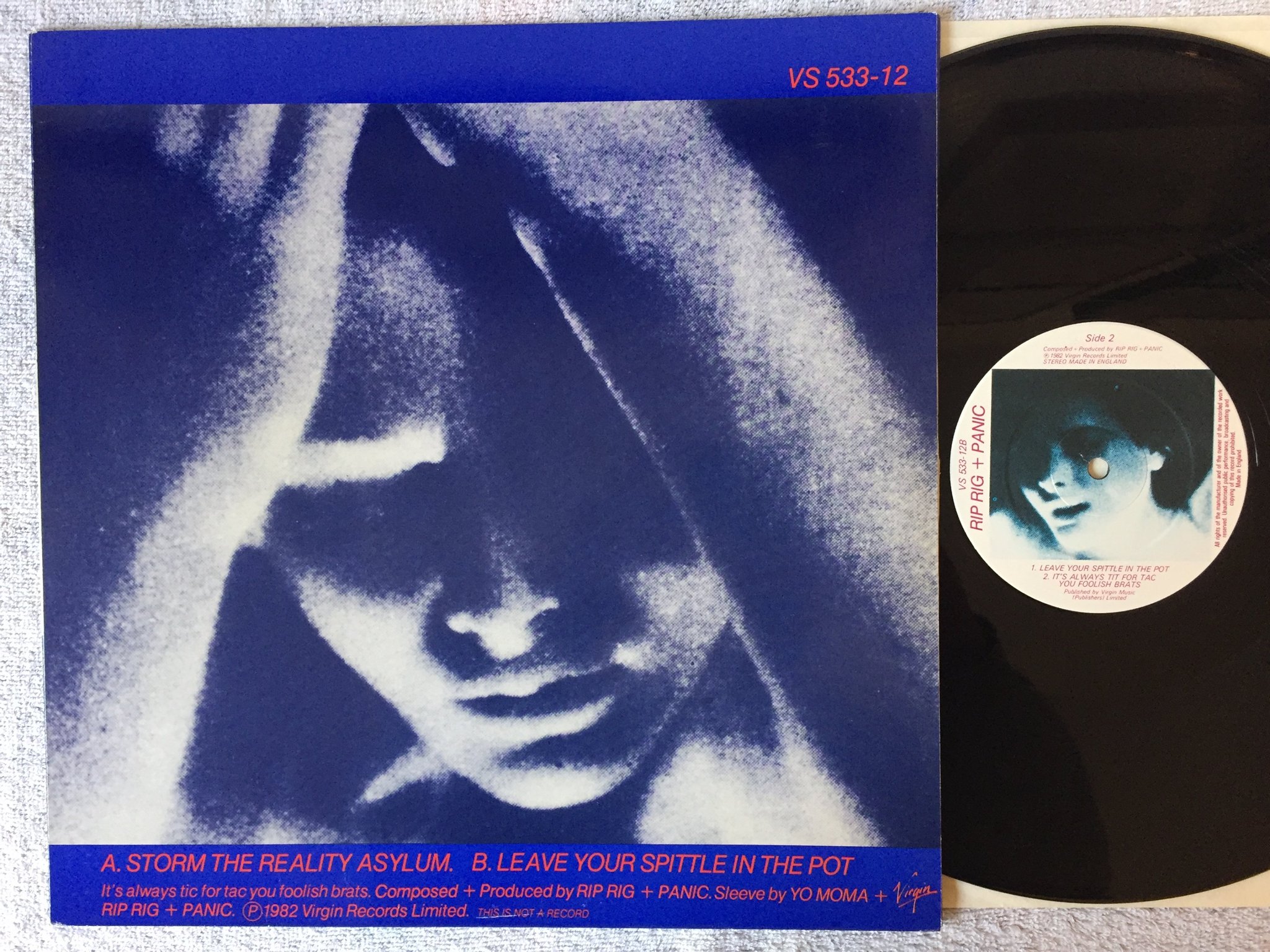 Omslagsbild för skivan RIP RIG + PANIC Storm The Reality Asylum 12"single -82 UK VIRGIN VS 533-12