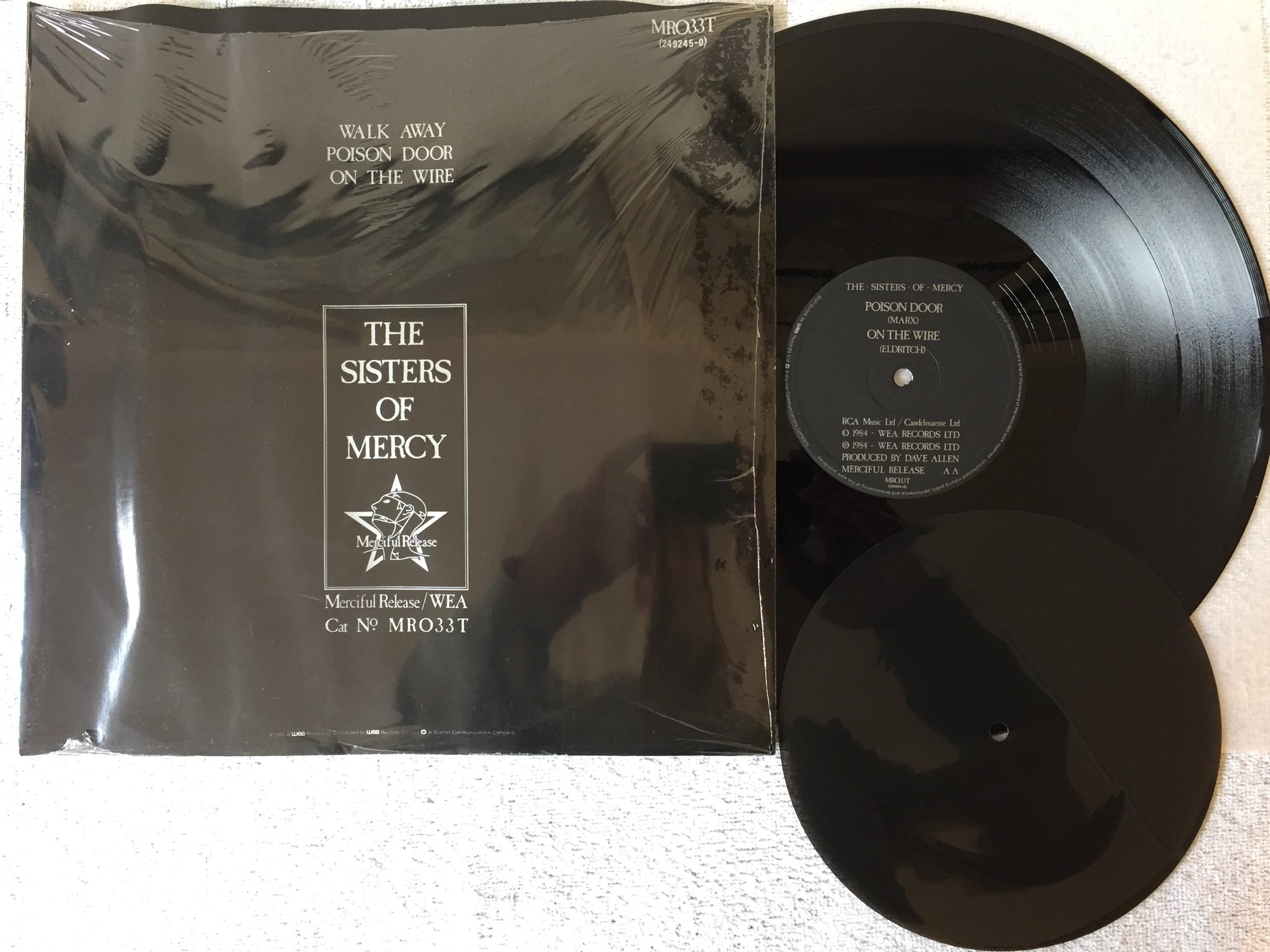 Omslagsbild för skivan THE SISTERS OF MERCY walk away 12" + 7"FLEXI -84 UK merciful MR033T