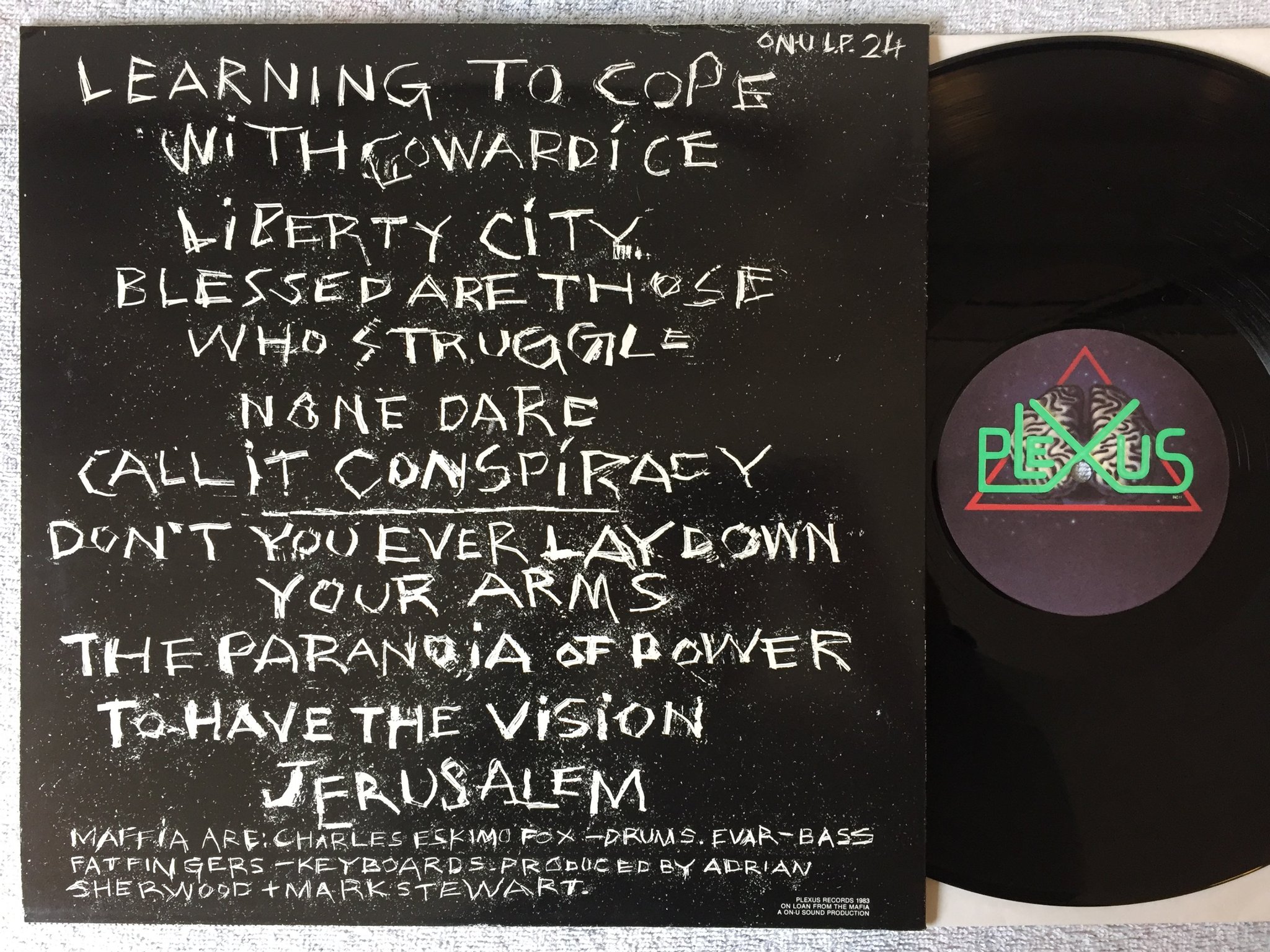 Omslagsbild för skivan MARK STEWART + MAFFIA Learning To Cope With Cowardice LP -83 PLEXUS dub