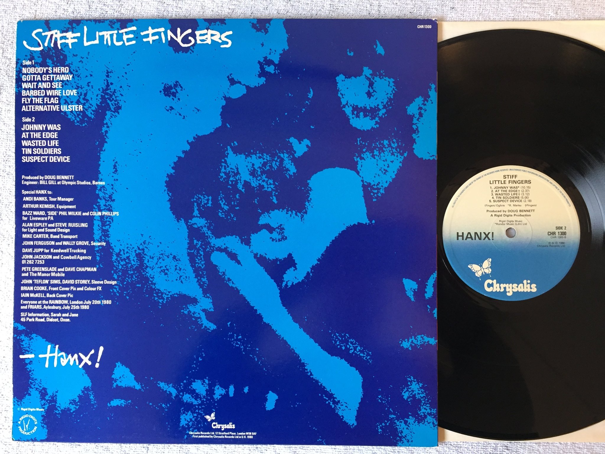 Omslagsbild för skivan STIFF LITTLE FINGERS Hanx! LP -80 UK CHRYSALIS CHR 1300