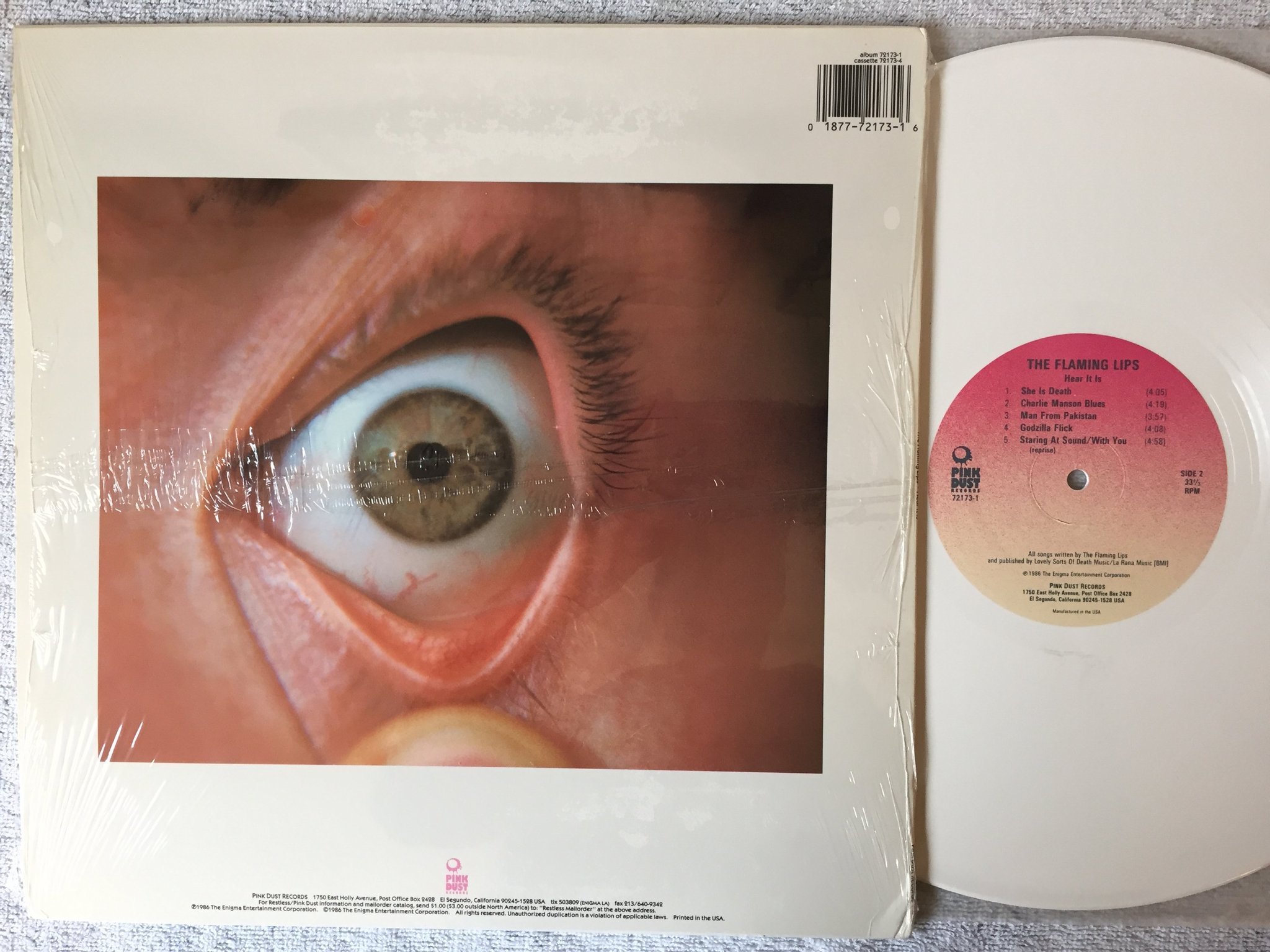 Omslagsbild för skivan THE FLAMING LIPS hear it is LP -86 US PINK DUST 72173-1 ltd MEGA RARE!!!