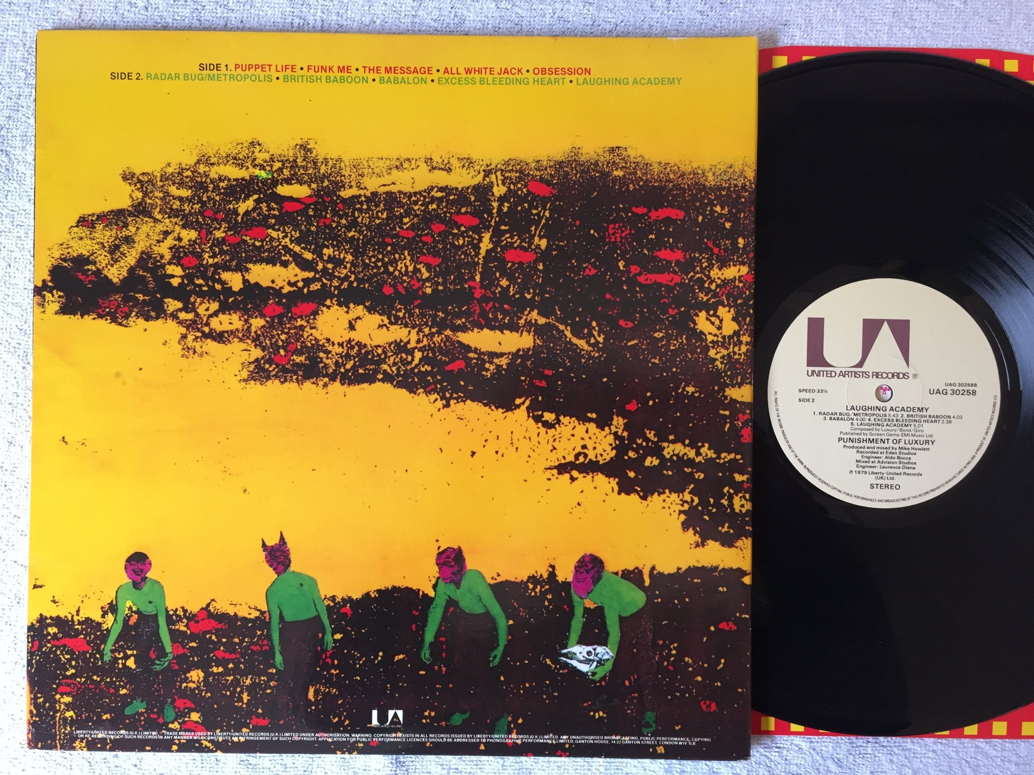 Omslagsbild för skivan THE PUNISHMENT OF LUXURY laughing academy LP -79 UK UNITED ARTISTS UAG 30258