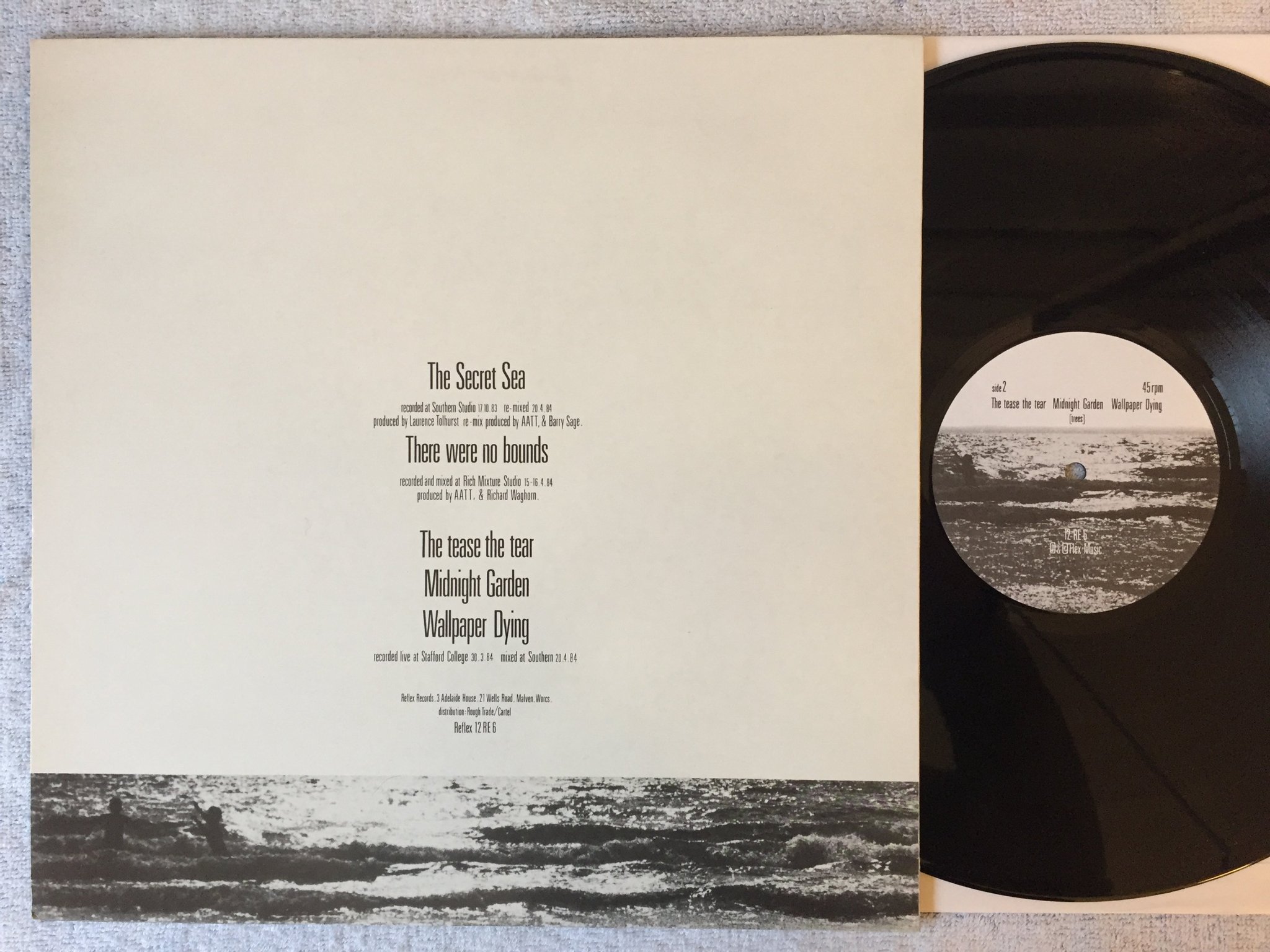Omslagsbild för skivan AND ALSO THE TREES the secret sea 12"single -84 UK REFLEX 12 RE 6 indie rock