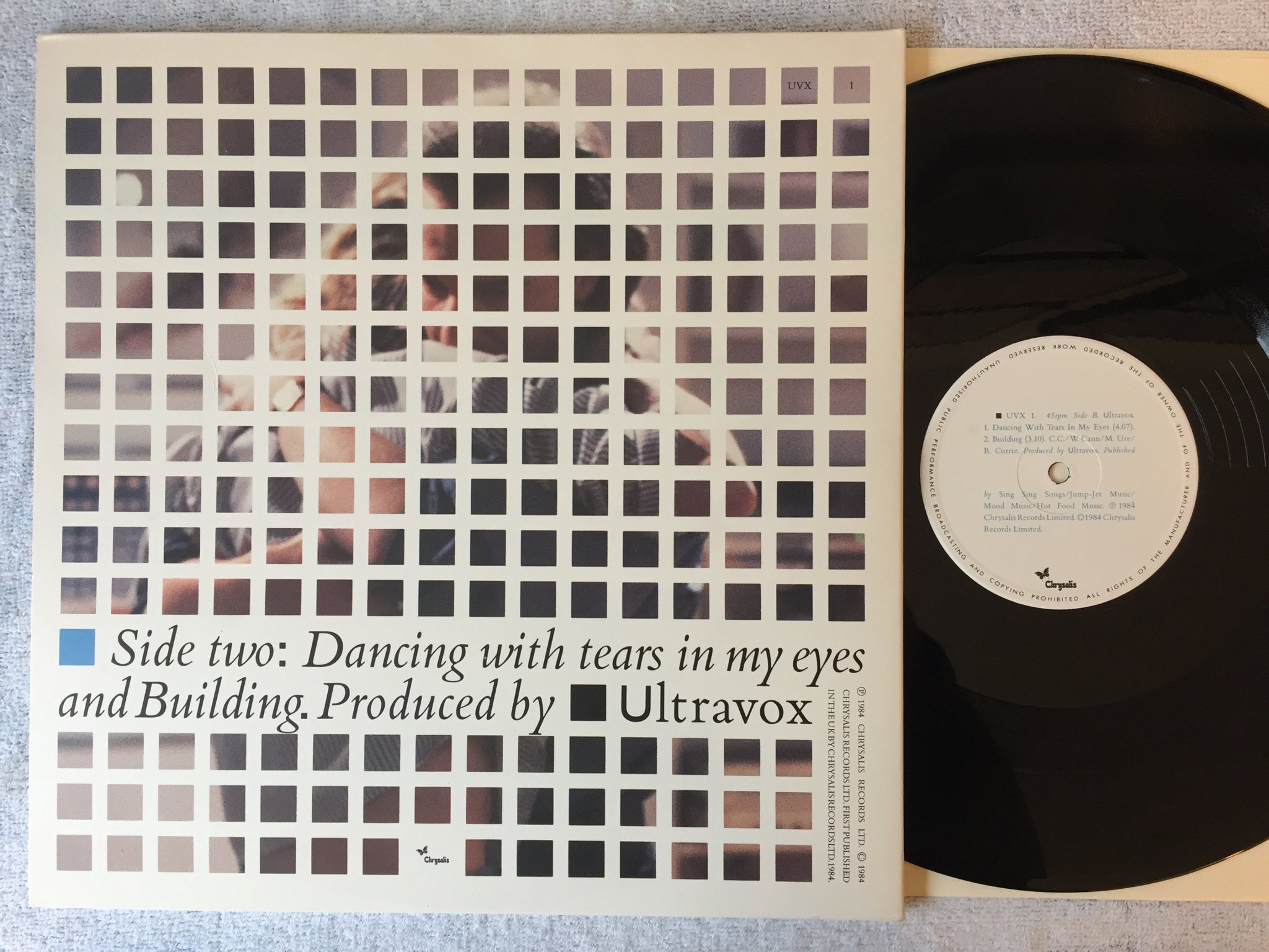 Omslagsbild för skivan ULTRAVOX Dancing With Tears In My Eyes 12"single UK -84 chrysalis UVX 1 + poster